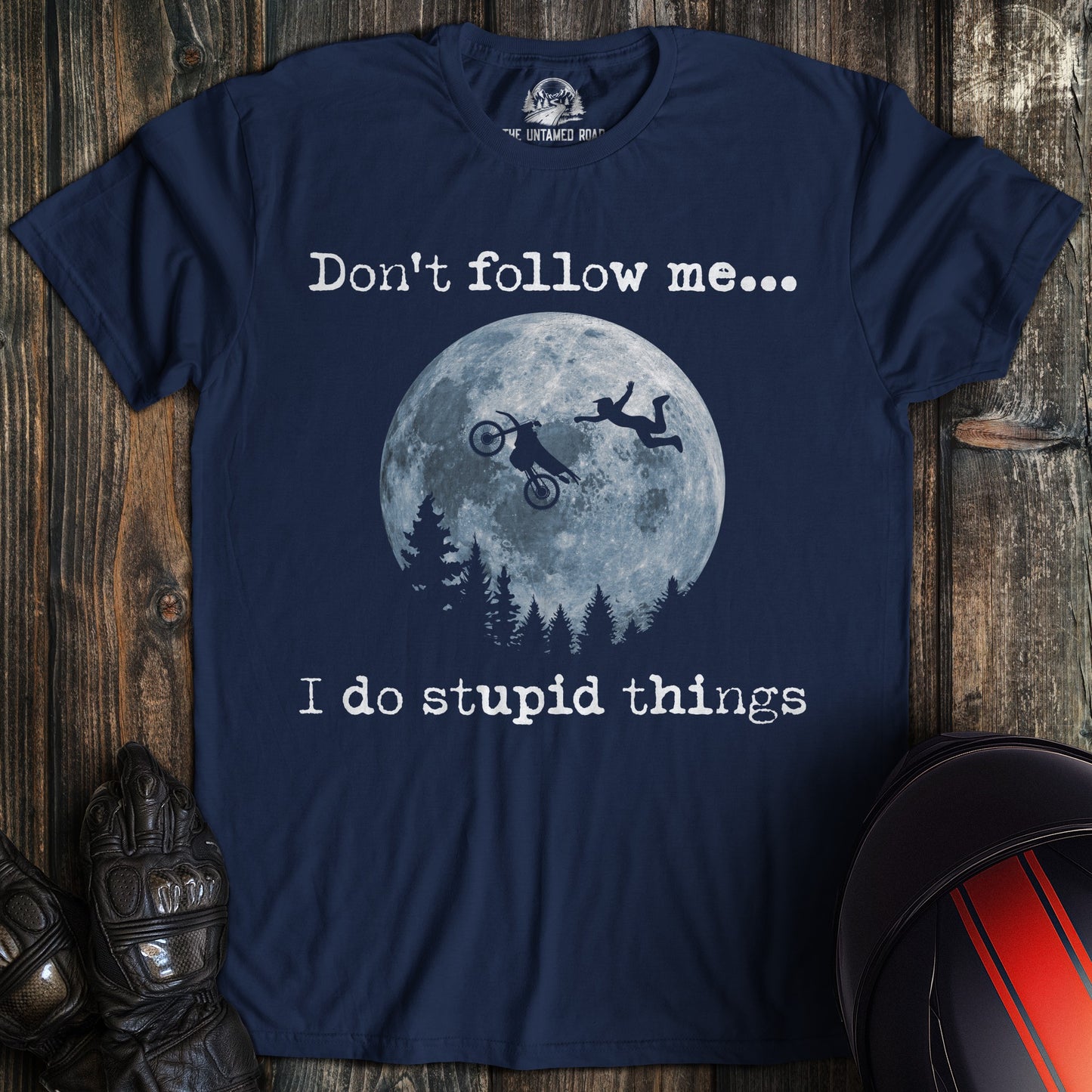 A navy colored t-shirt with the words "dont follow me dirtbike" printed on the front.