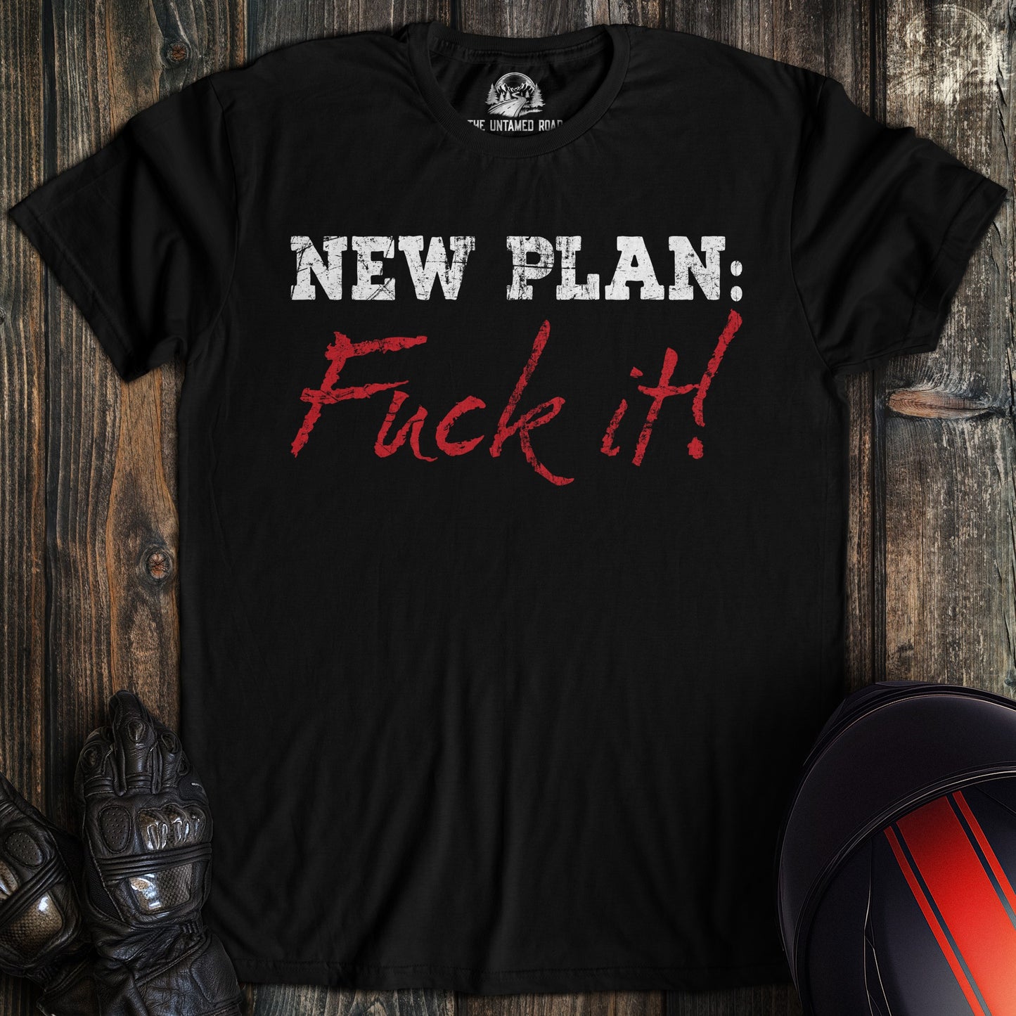 A black colored t-shirt with the words "new plan" printed on the front.