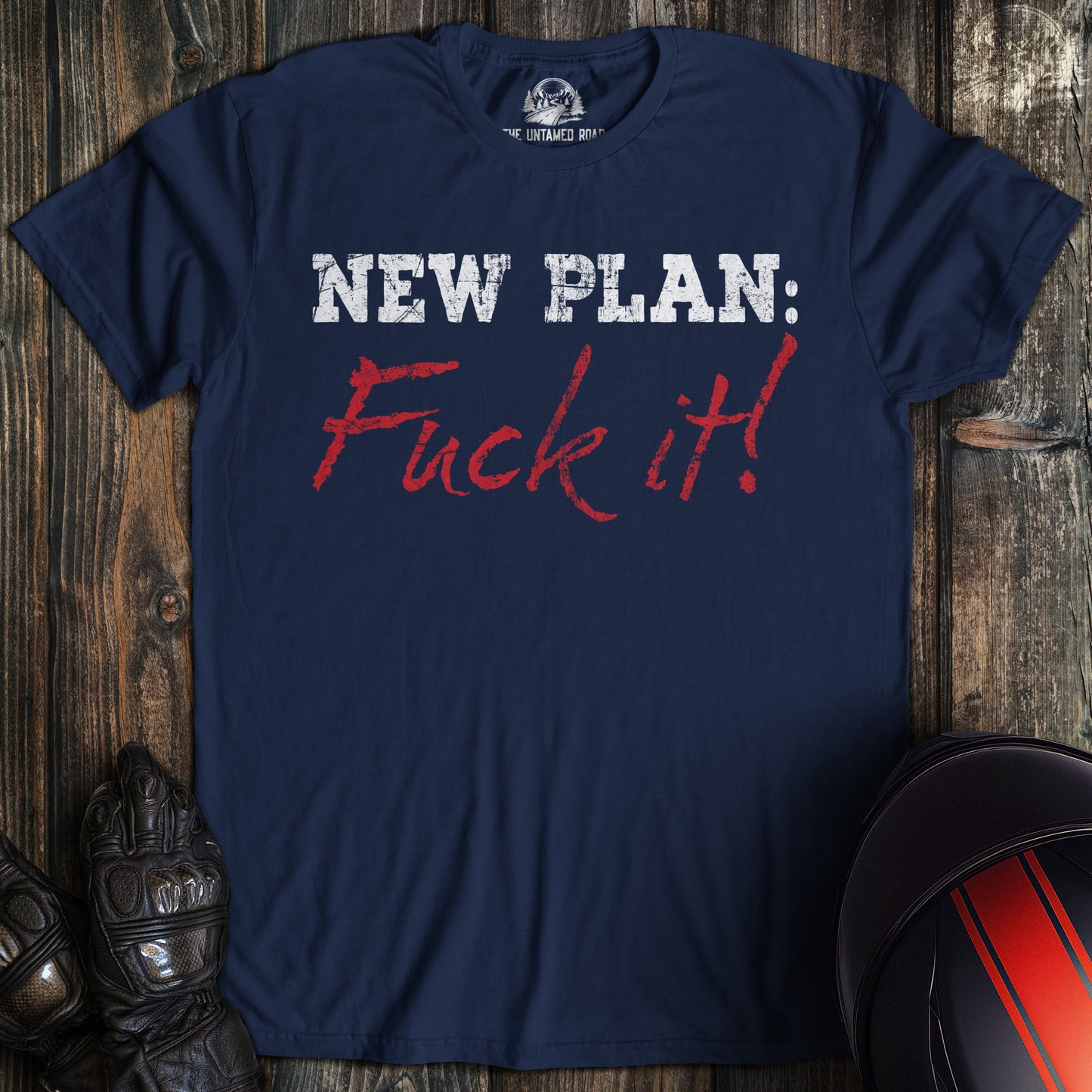 A navy colored t-shirt with the words "new plan" printed on the front.