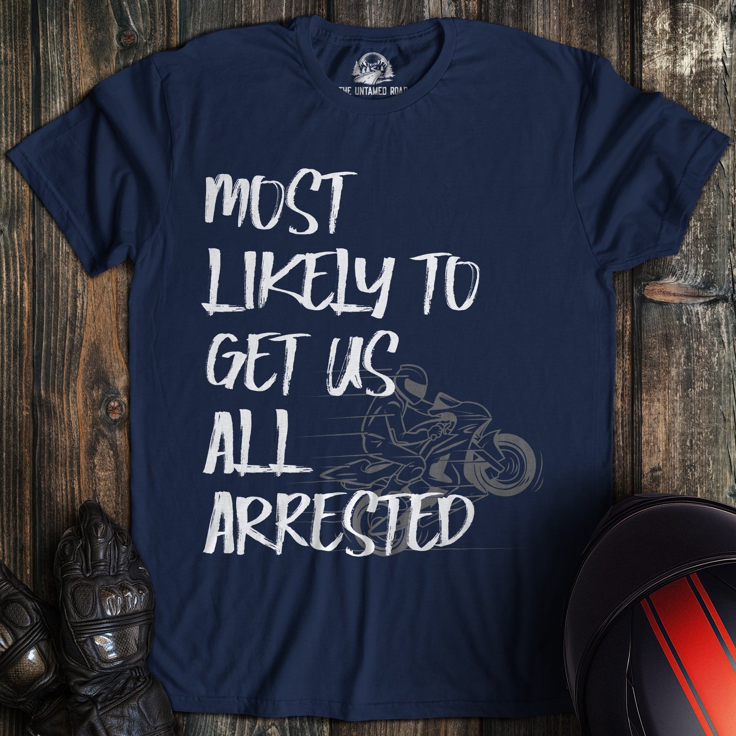 A navy colored t-shirt with the words "most likely to get us arrested" printed on the front.
