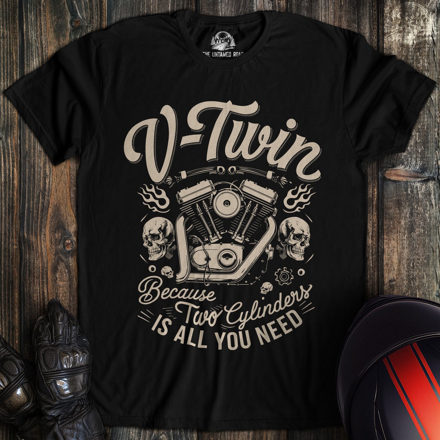 A black colored t-shirt with the words "two cylinders all you need" printed on the front.