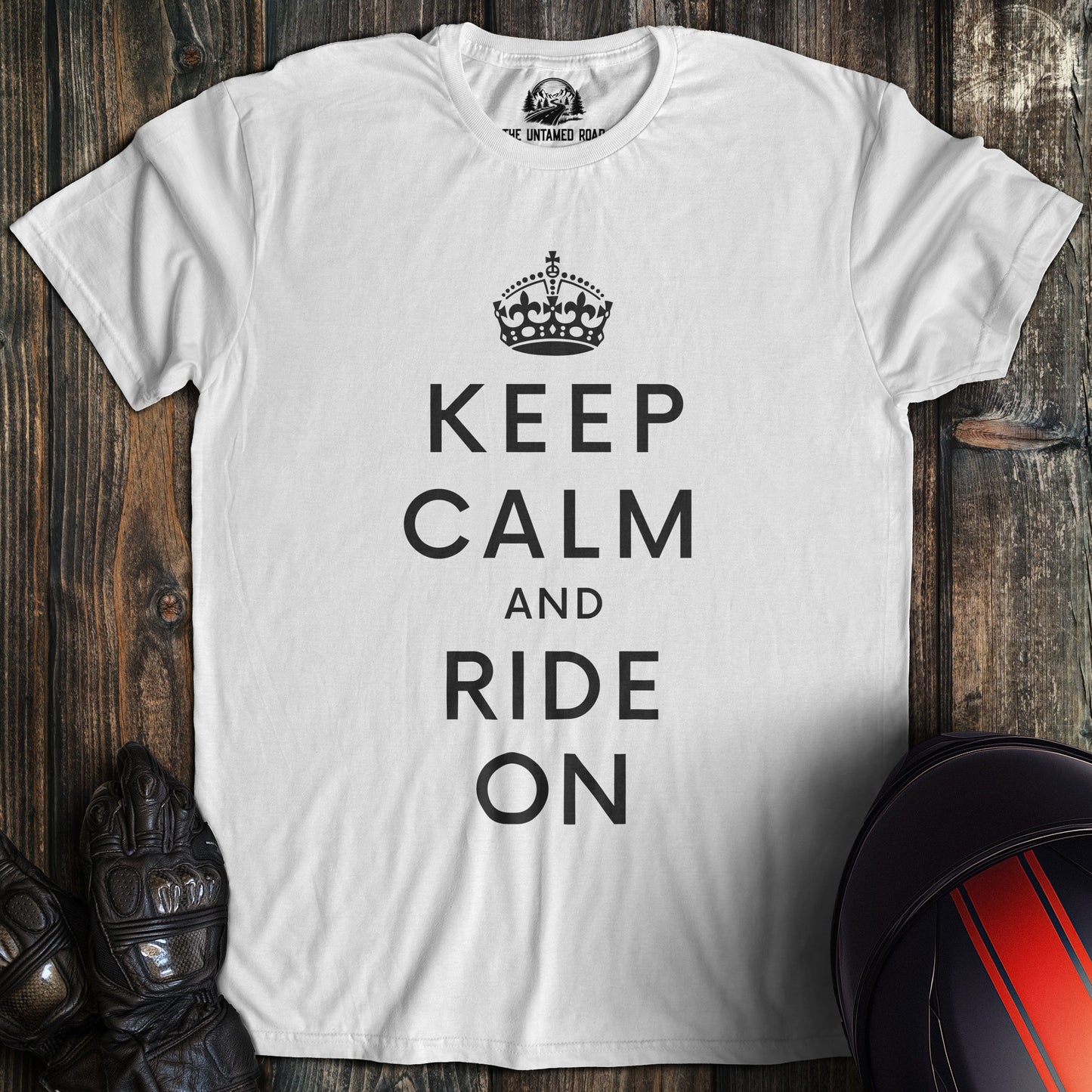 A white colored t-shirt with the words "keep calm" printed on the front.