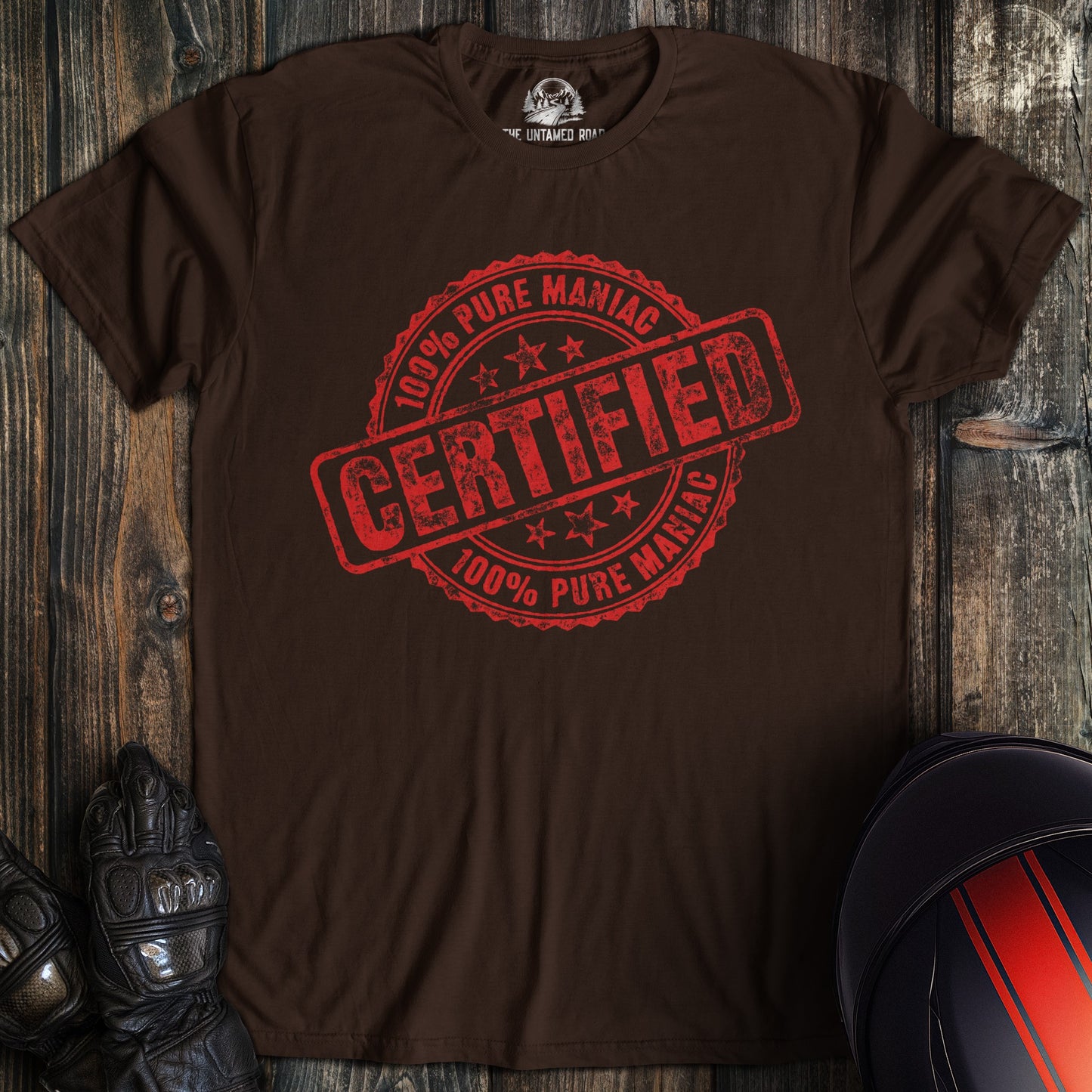 A dark chocolate colored t-shirt with the words "certified" printed on the front.