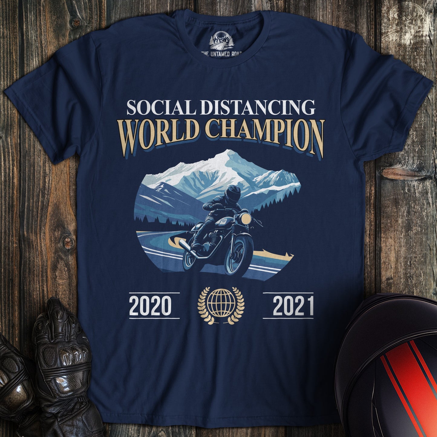 A navy colored t-shirt with the words "social distance champ" printed on the front.