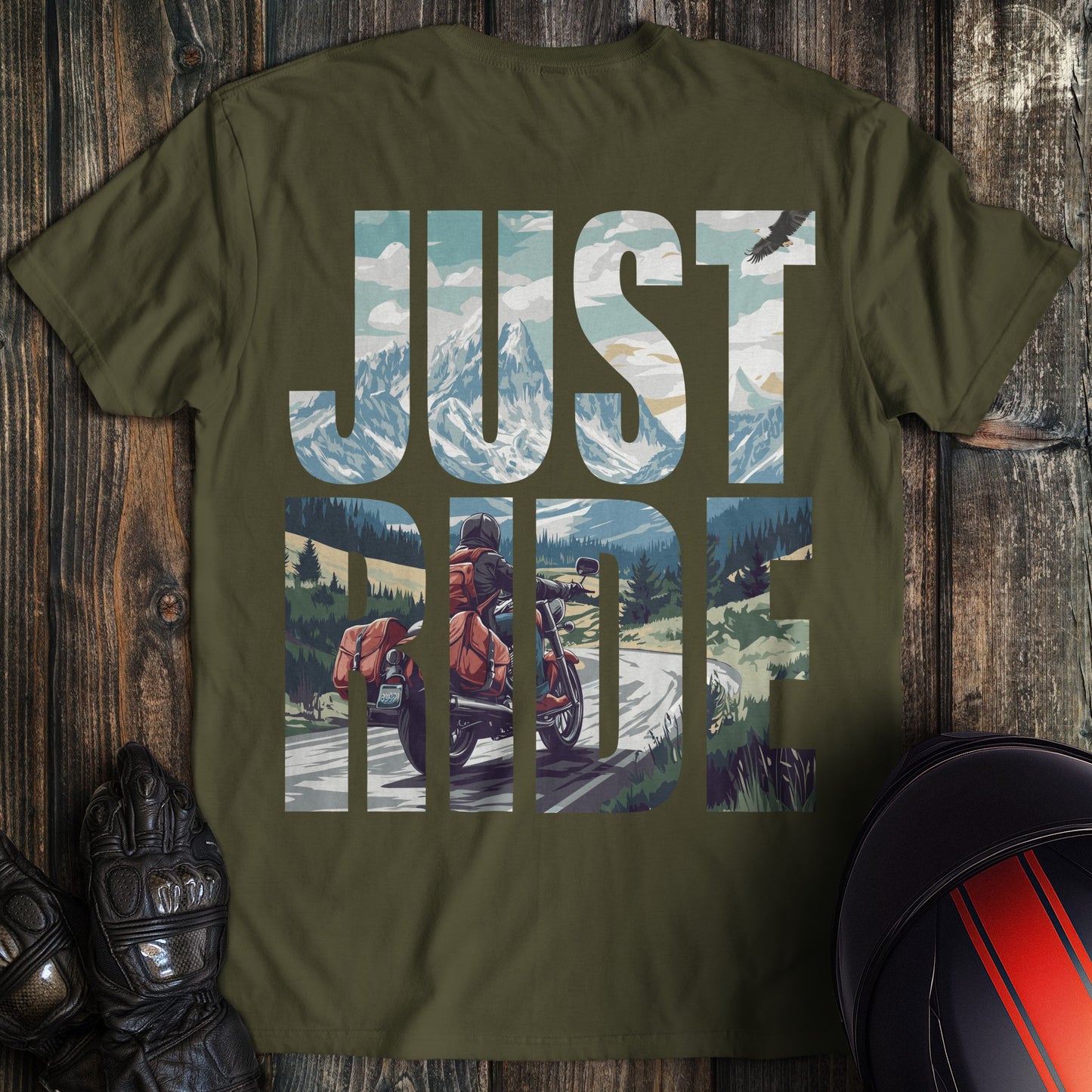 A military green colored t-shirt with the words "just ride" printed on the back.