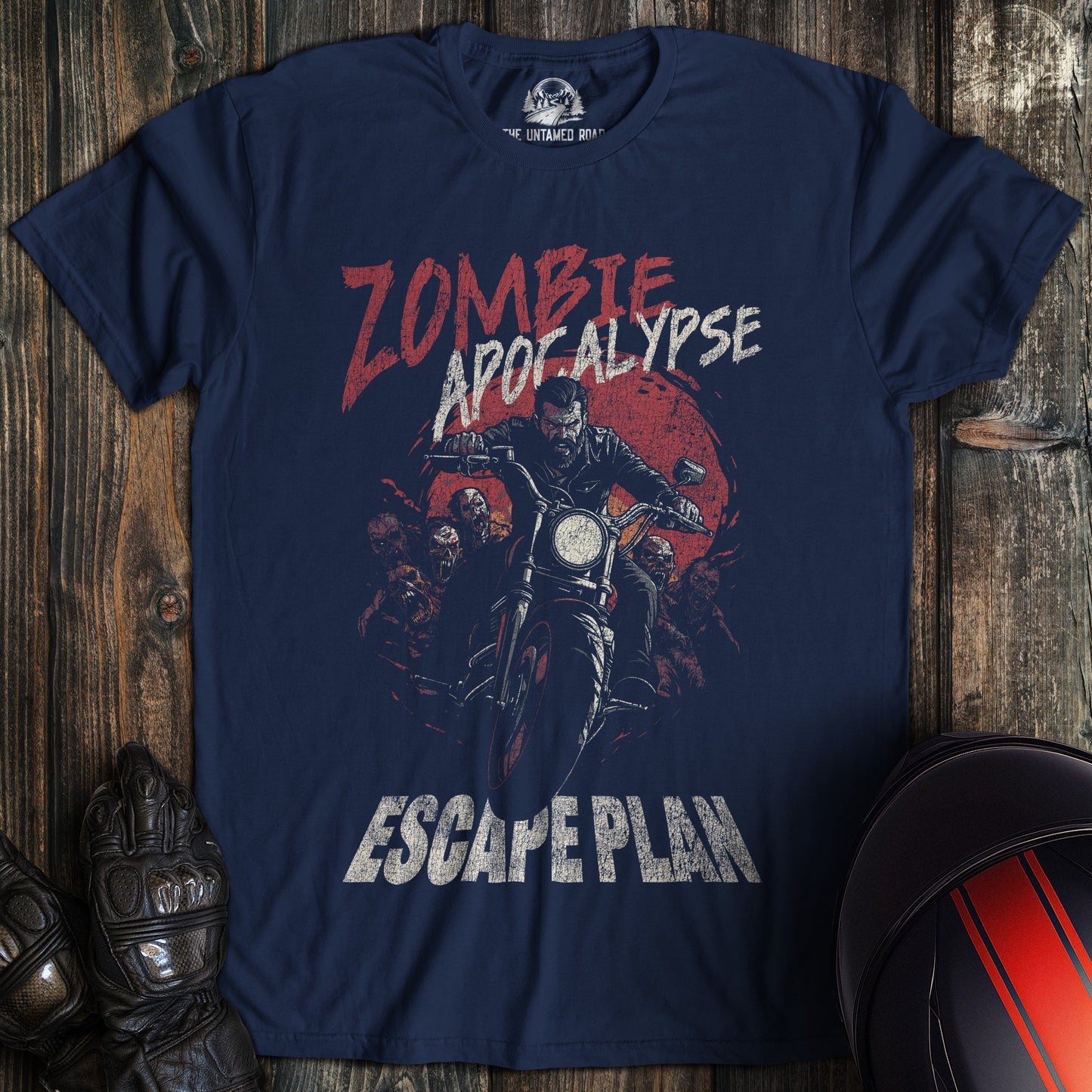 A navy colored t-shirt with the words "zombie apocalypse" printed on the front.