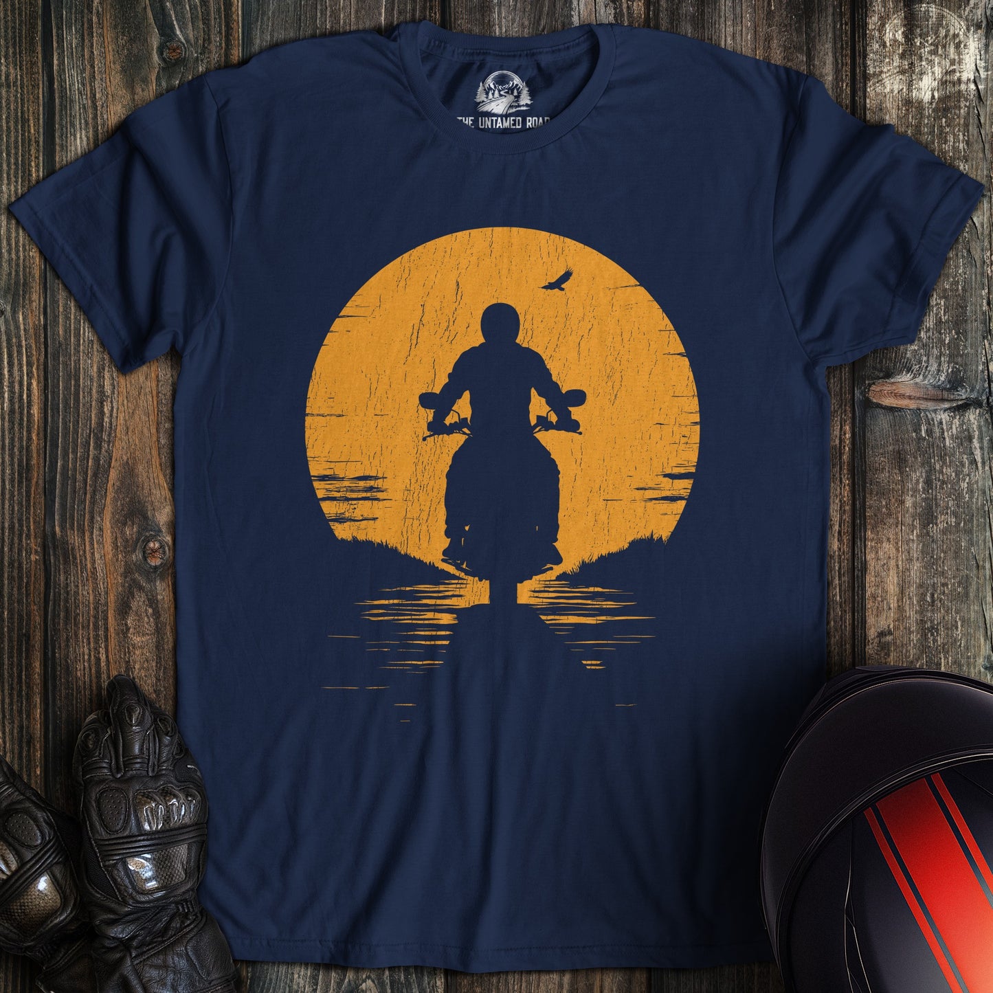 A navy colored t-shirt with the words "sunset" printed on the front.