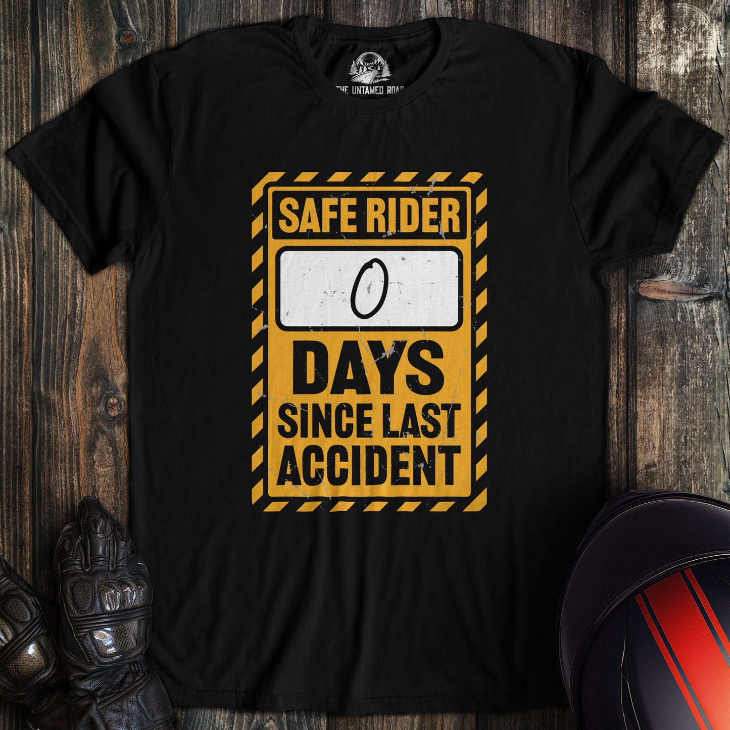 A black colored t-shirt with the words "zero days since accident" printed on the front.