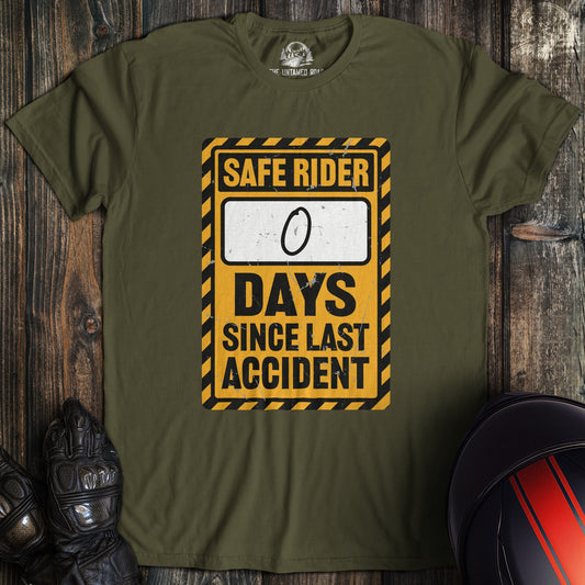 A military green colored t-shirt with the words "zero days since accident" printed on the front.
