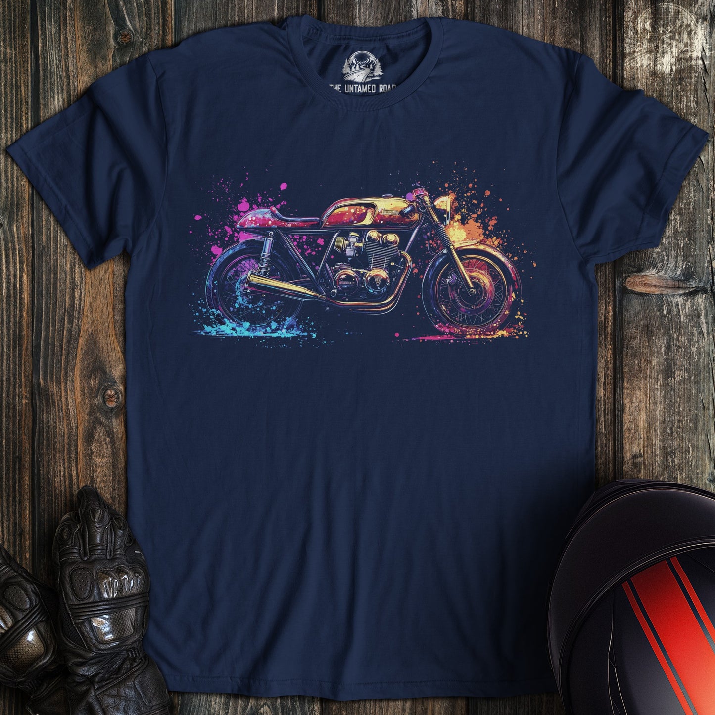 A navy colored t-shirt with the words "pop art cafe racer" printed on the front.