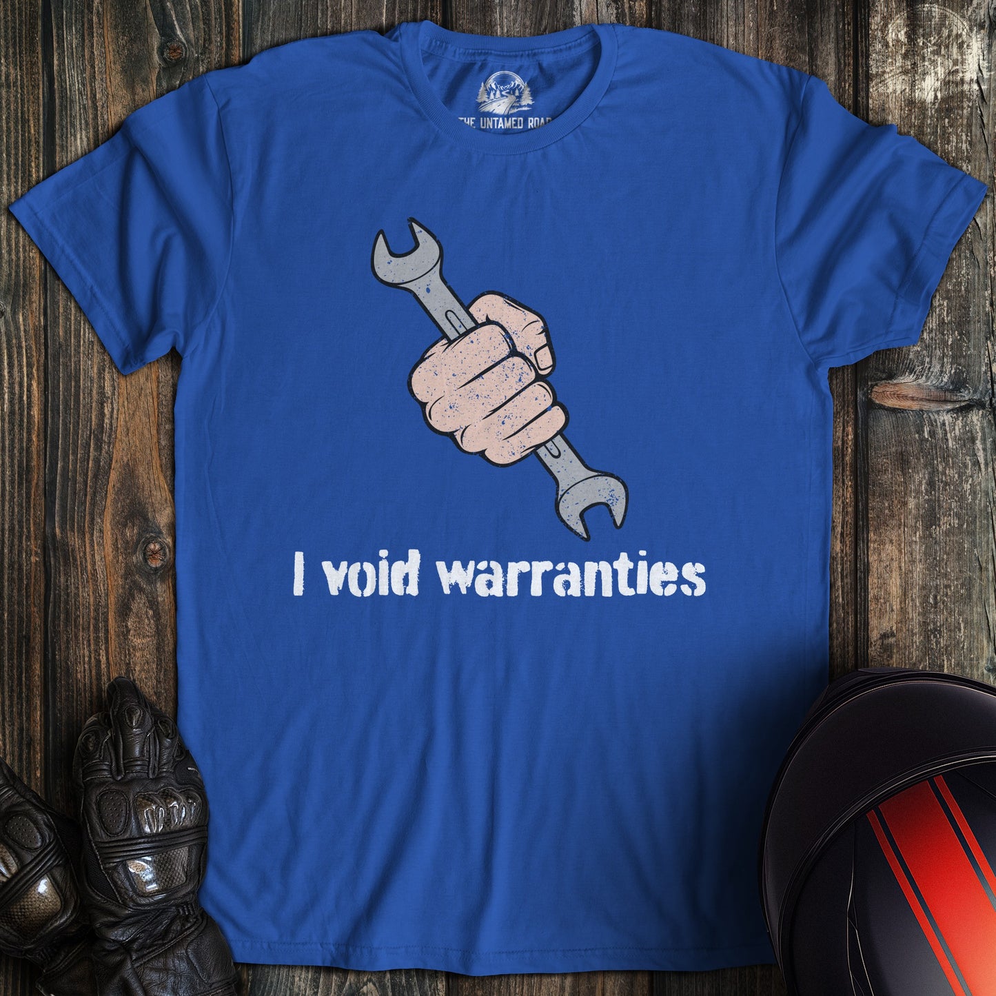 A royal blue colored t-shirt with the words "ivoid warranties" printed on the front.