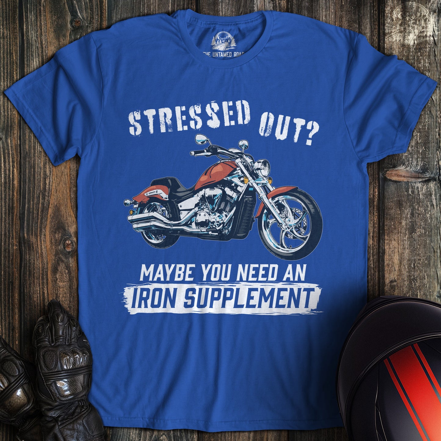 A royal blue colored t-shirt with the words "iron supplement" printed on the front.