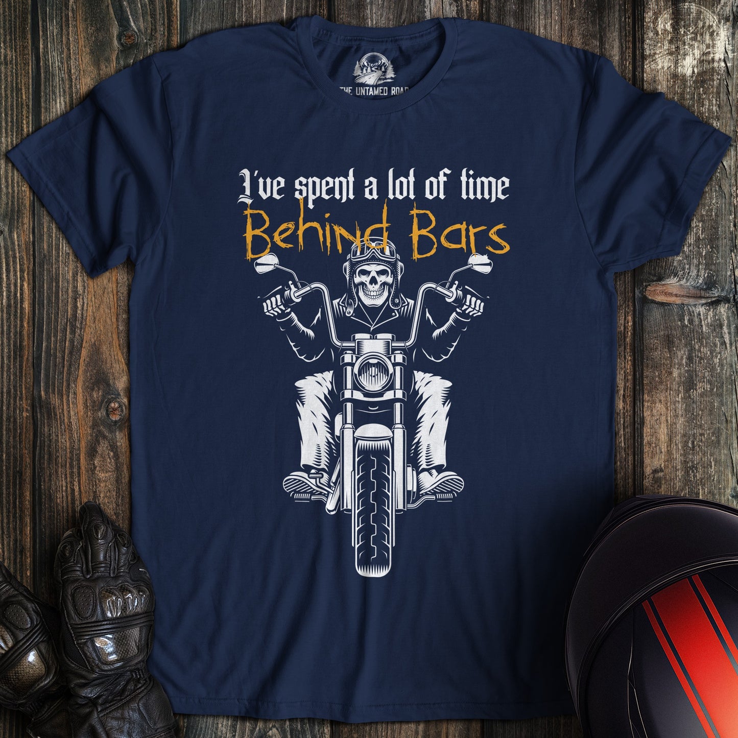 A navy colored t-shirt with the words "time behind bars" printed on the front.