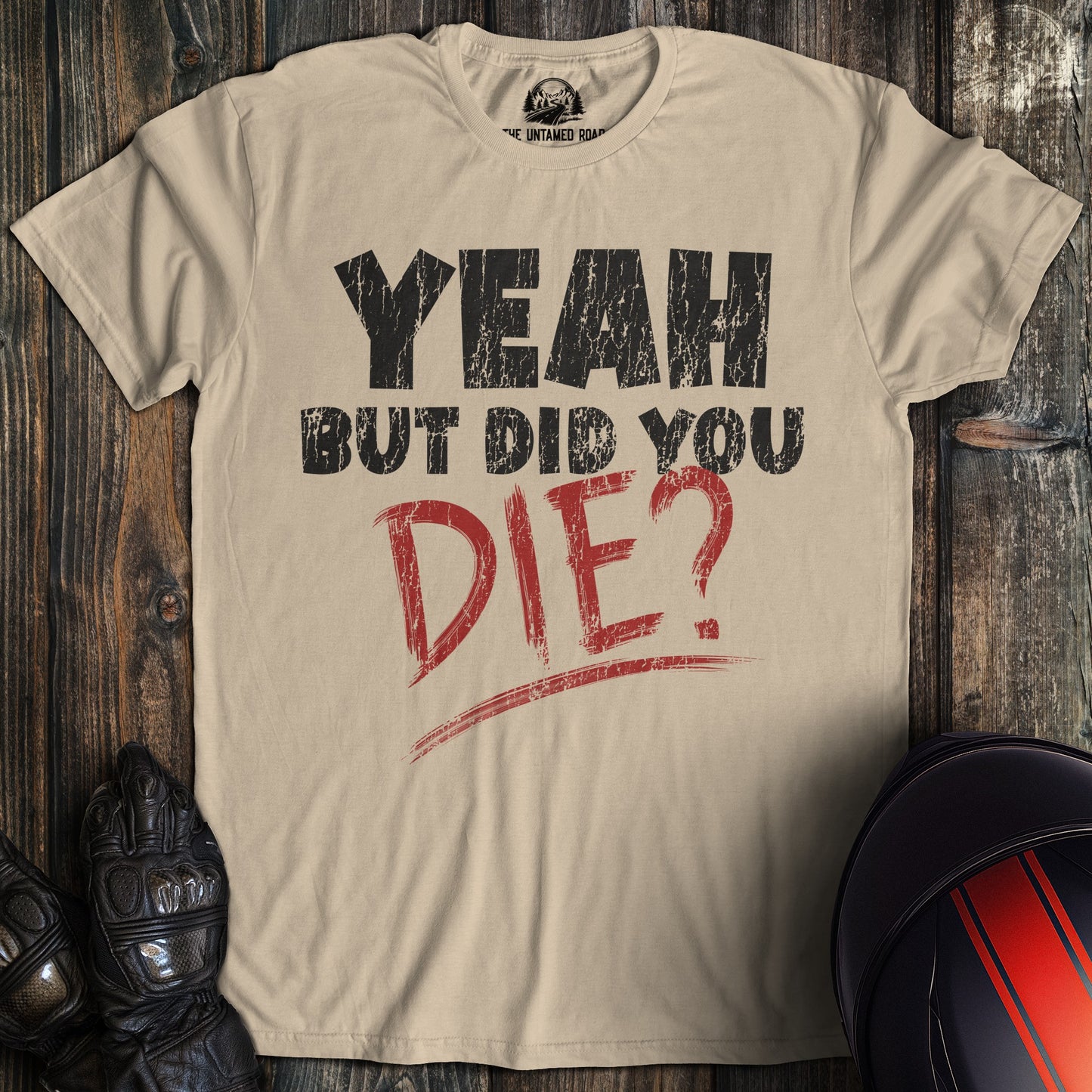 A sand colored t-shirt with the words "did you die" printed on the front.