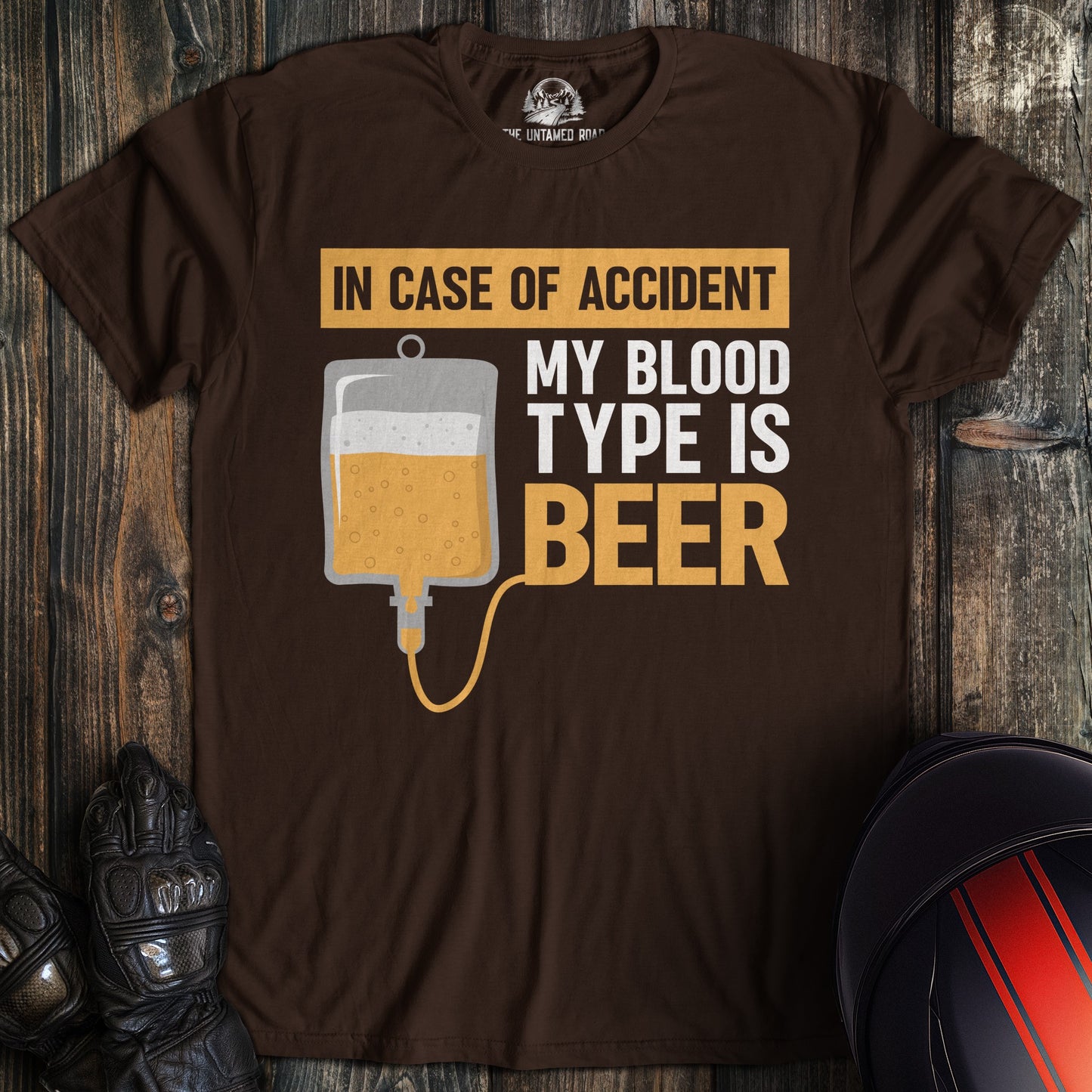 A dark chocolate colored t-shirt with the words "blood type beer" printed on the front.