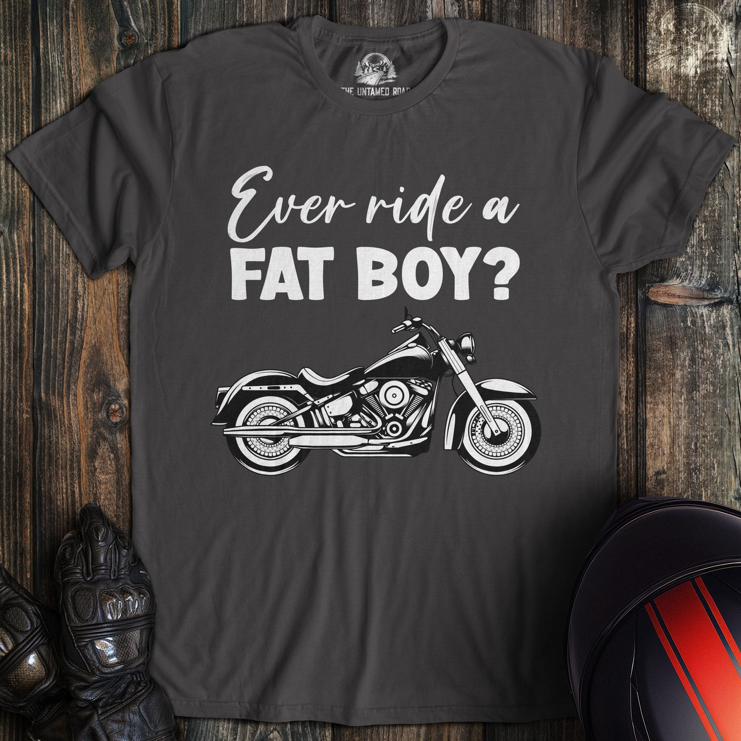 A charcoal colored t-shirt with the words "ever ride afat boy" printed on the front.