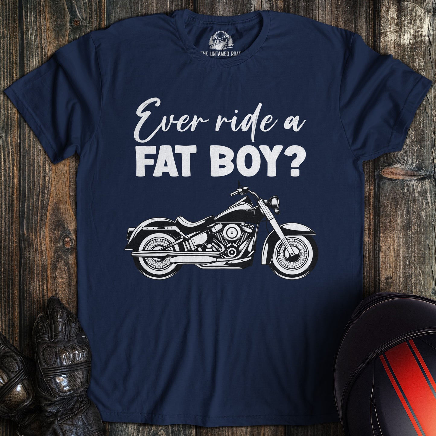 A navy colored t-shirt with the words "ever ride afat boy" printed on the front.