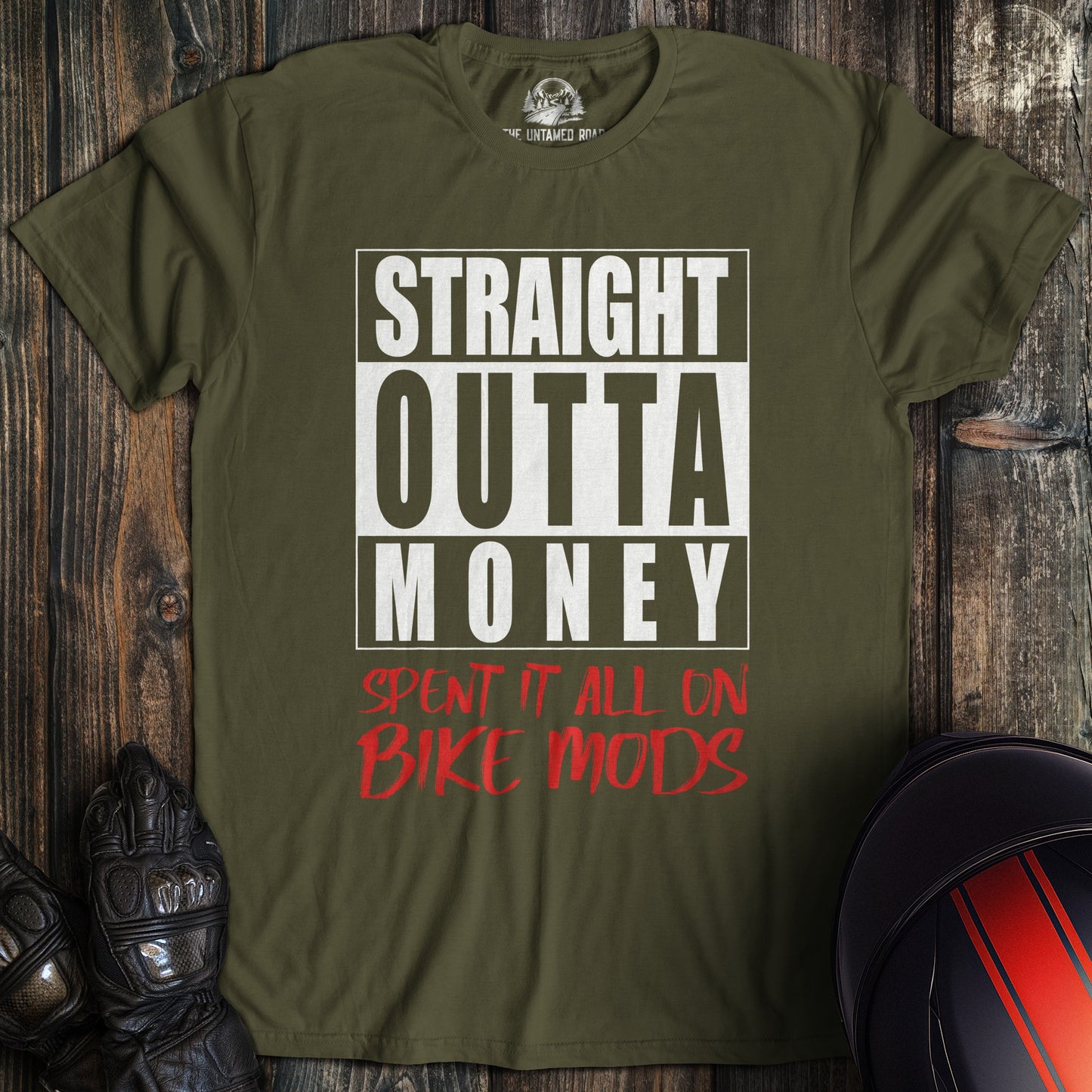 A military green colored t-shirt with the words "straight outta money" printed on the front.
