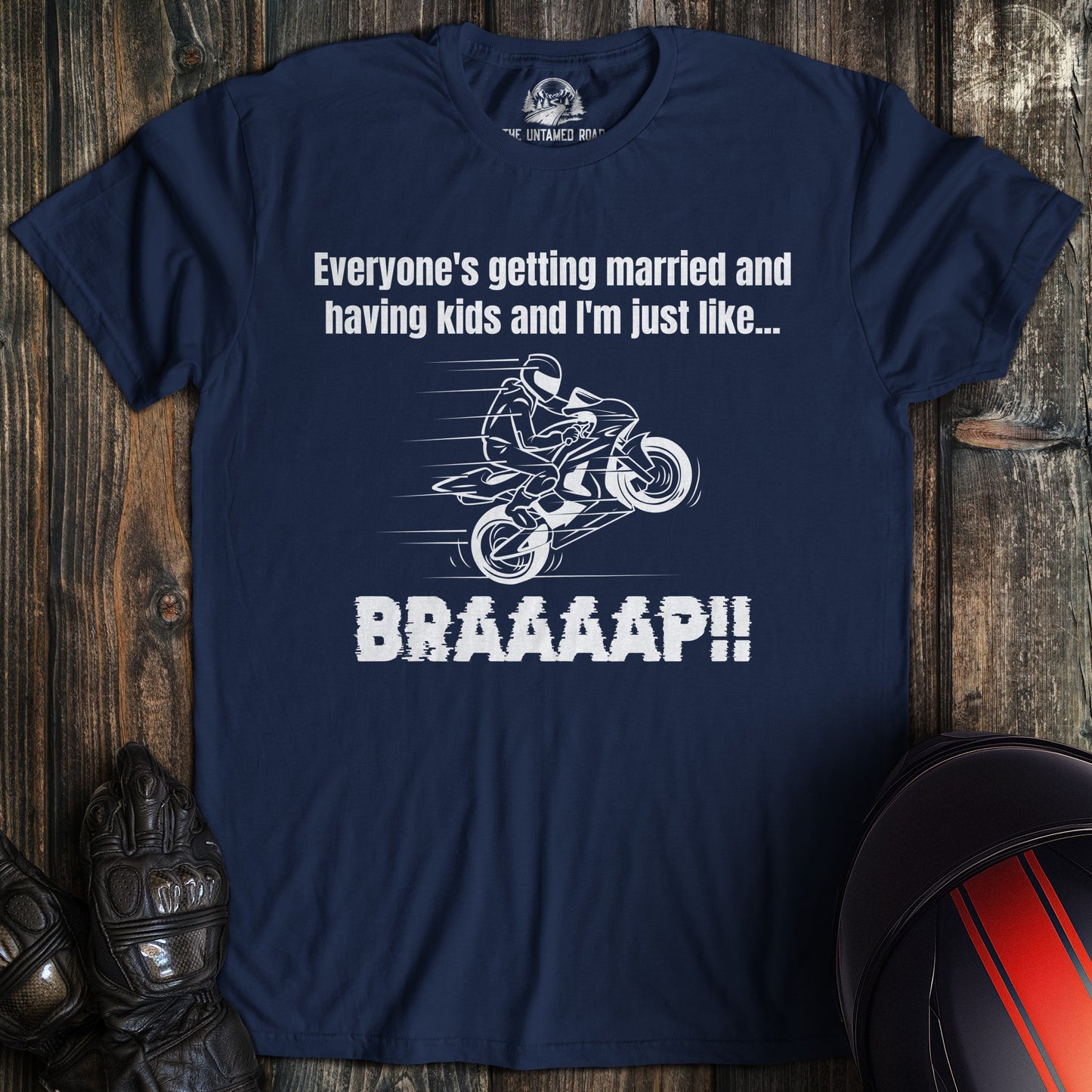 A navy colored t-shirt with the words "just like braaap" printed on the front.