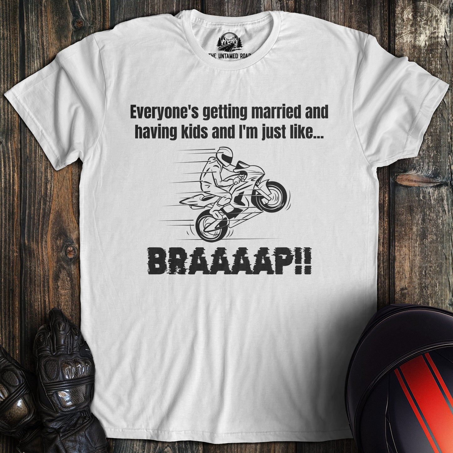 A white colored t-shirt with the words "just like braaap" printed on the front.