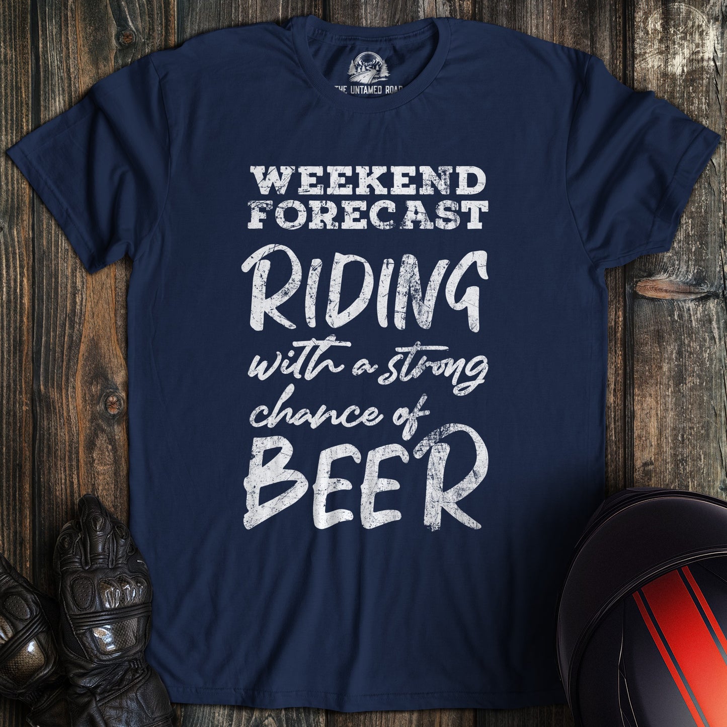 A navy colored t-shirt with the words "weekend forecast" printed on the front.