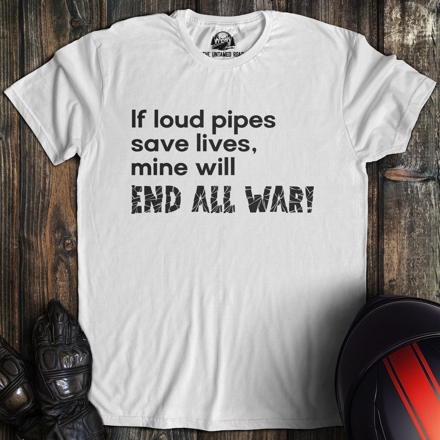 A white colored t-shirt with the words "loud pipes end war" printed on the front.