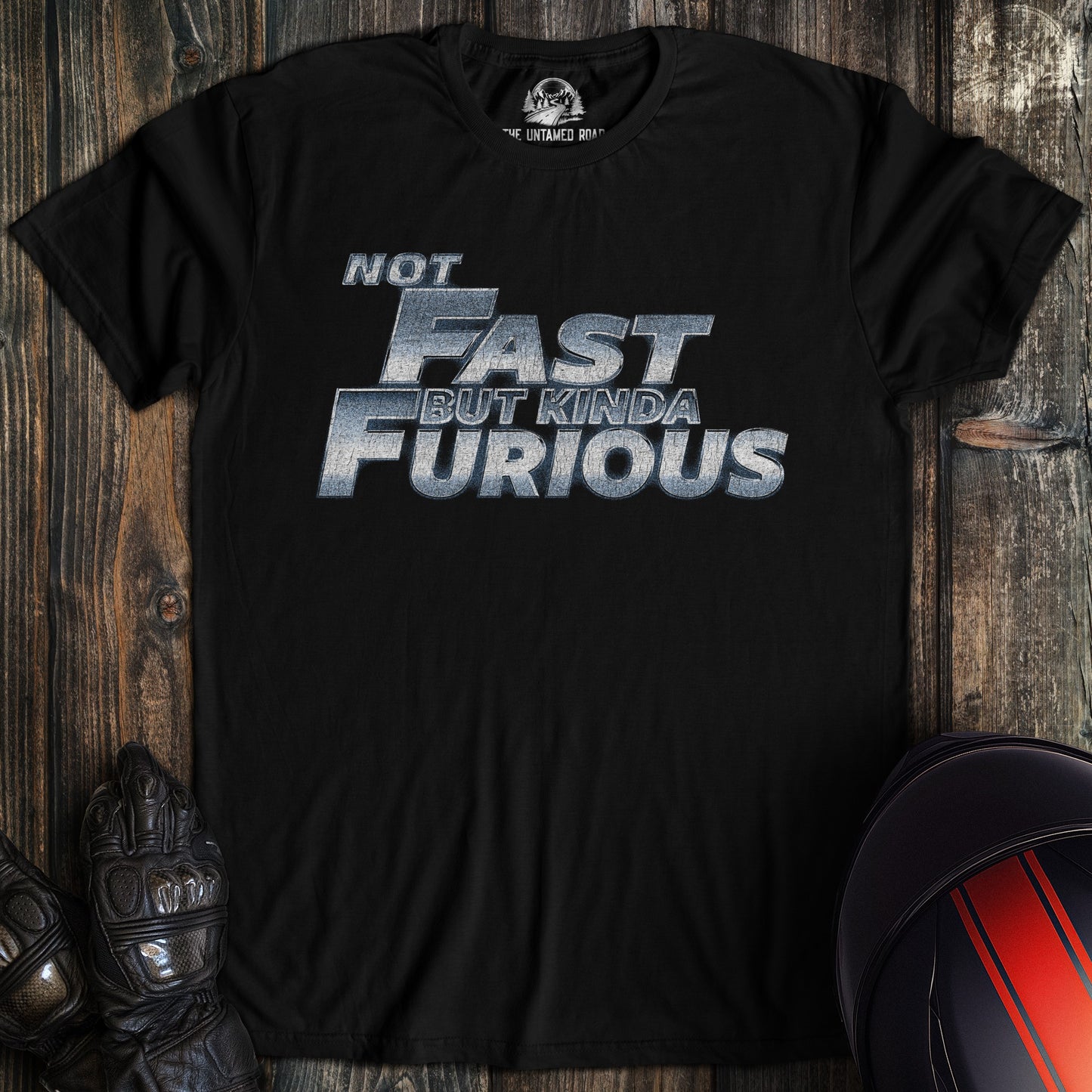 A black colored t-shirt with the words "not fast kinda furious chrome" printed on the front.