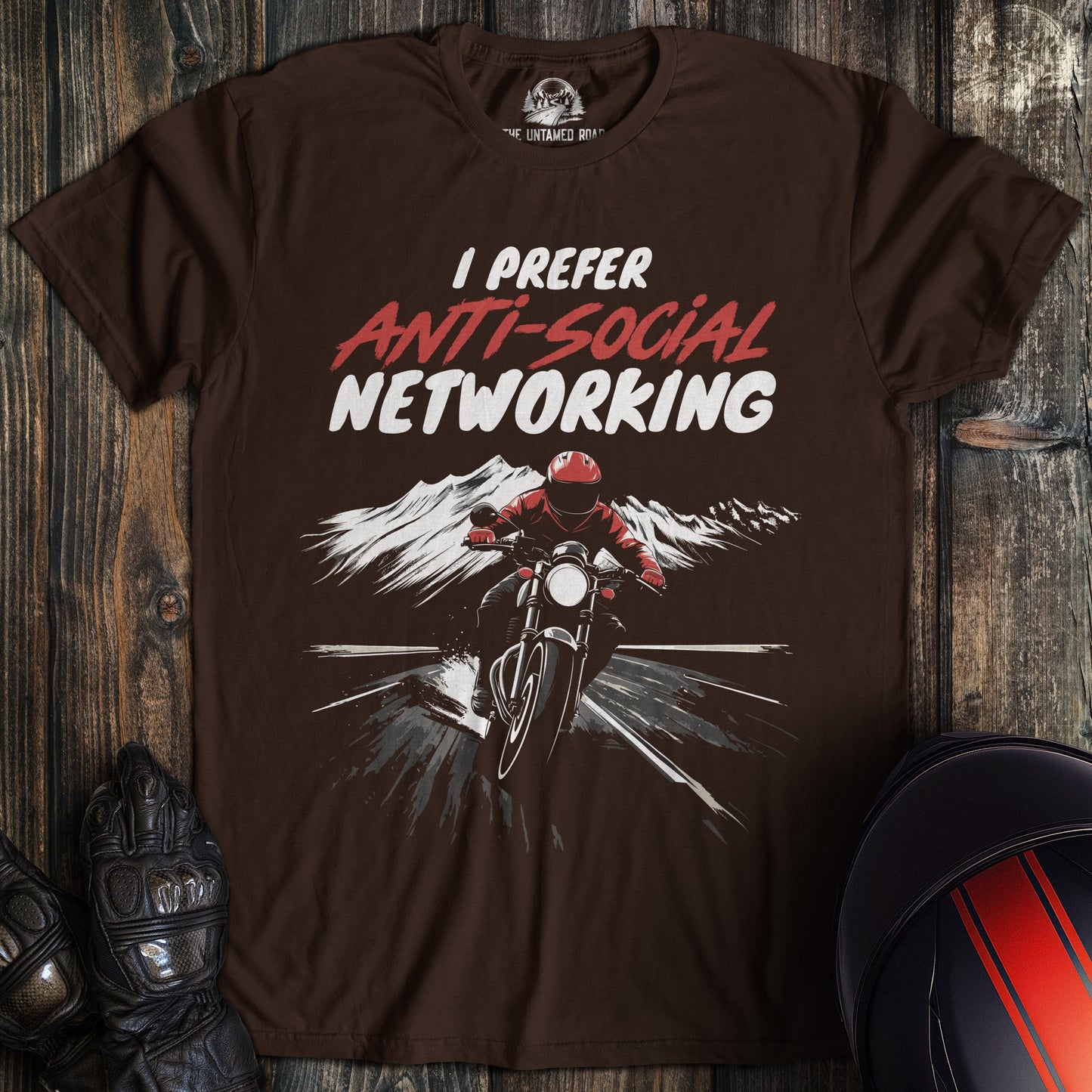 A dark chocolate colored t-shirt with the words "anti social networking 02" printed on the front.