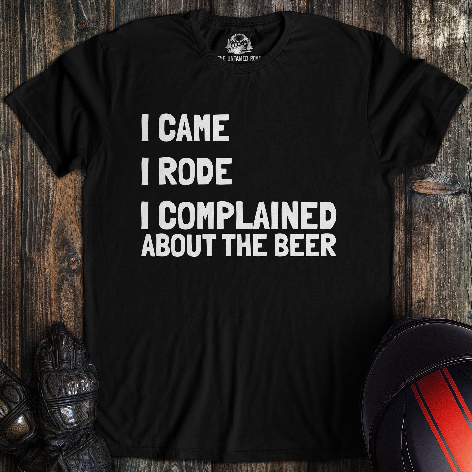 A black colored t-shirt with the words "came rode complained" printed on the front.