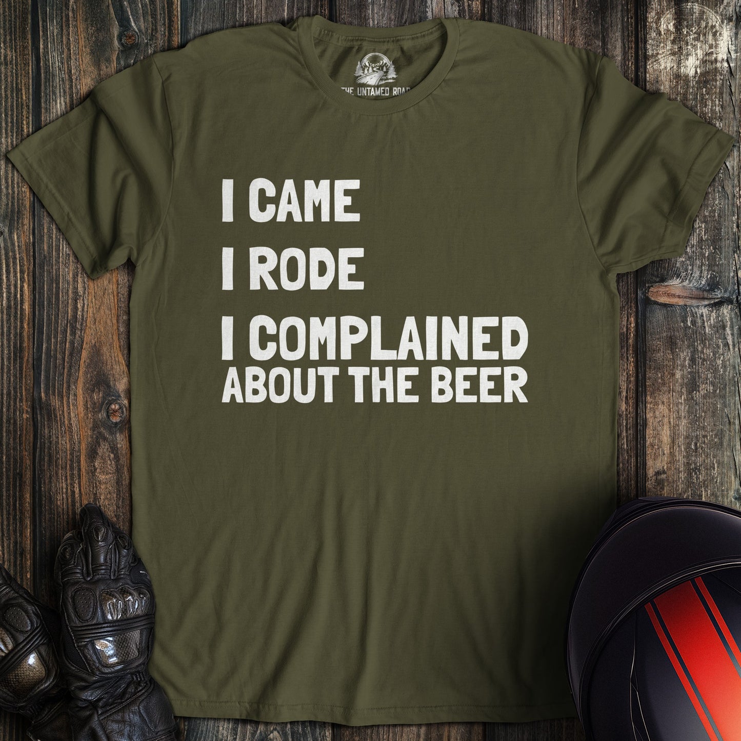 A military green colored t-shirt with the words "came rode complained" printed on the front.