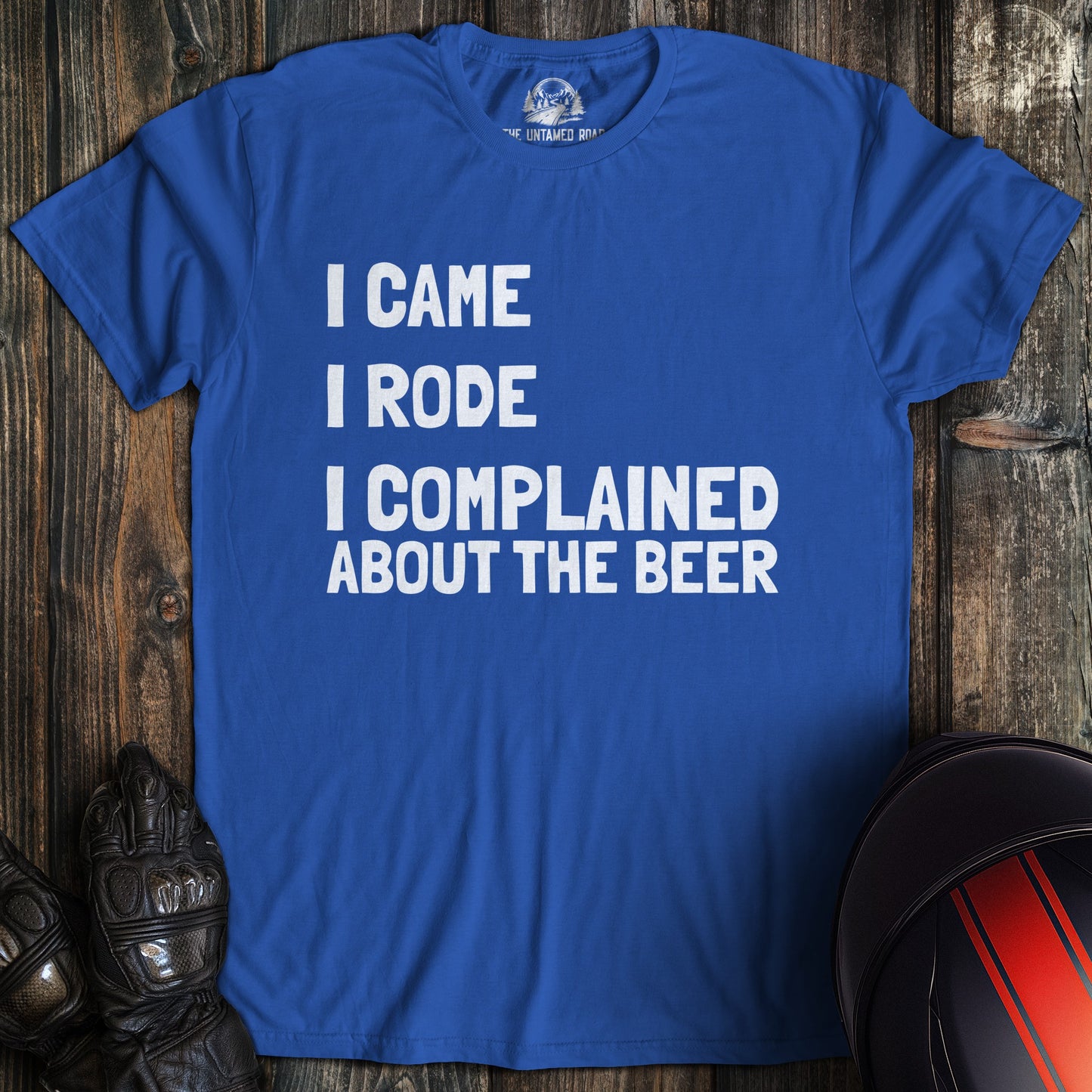 A royal blue colored t-shirt with the words "came rode complained" printed on the front.