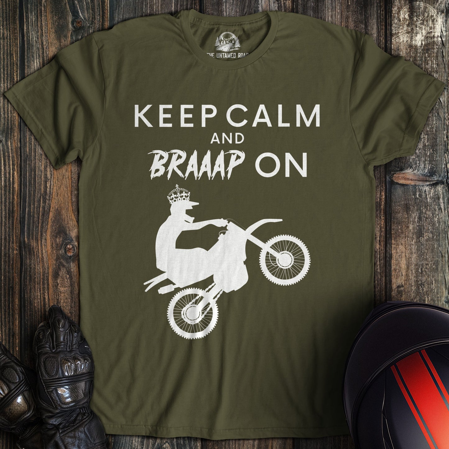 A military green colored t-shirt with the words "keep calm braaap" printed on the front.
