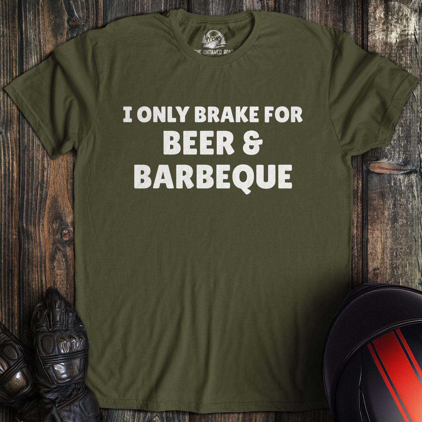 A military green colored t-shirt with the words "brake for beer and bbq" printed on the front.