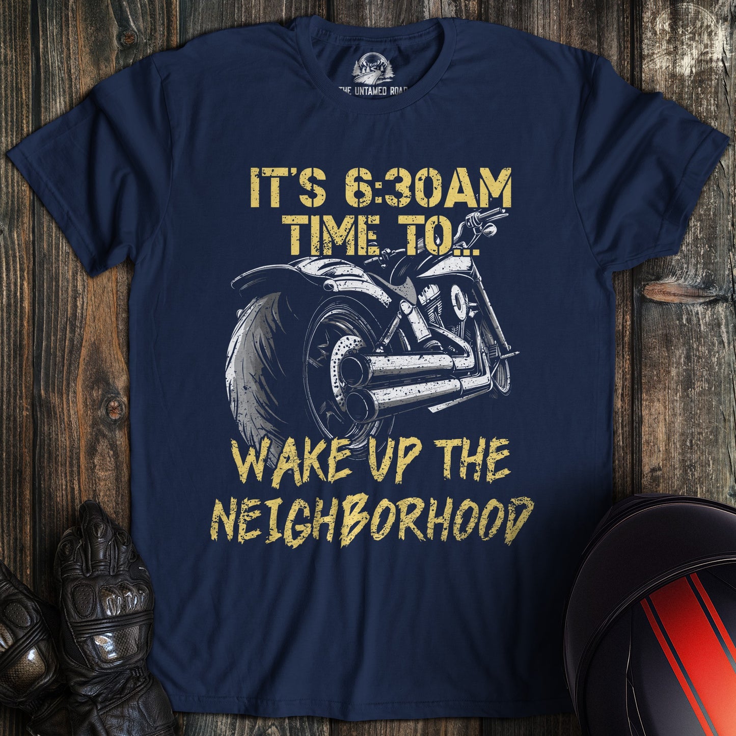 A navy colored t-shirt with the words "wake the neighborhood" printed on the front.