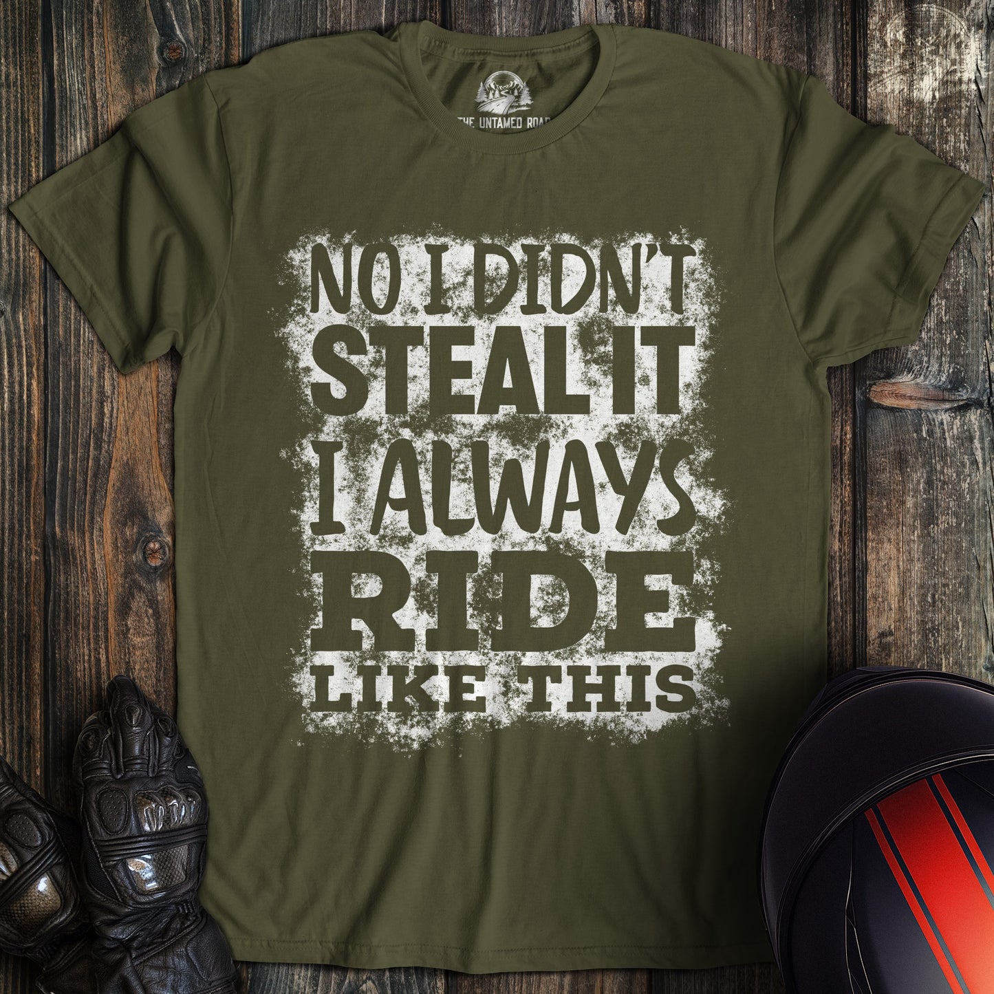 A military green colored t-shirt with the words "didnt steal it" printed on the front.