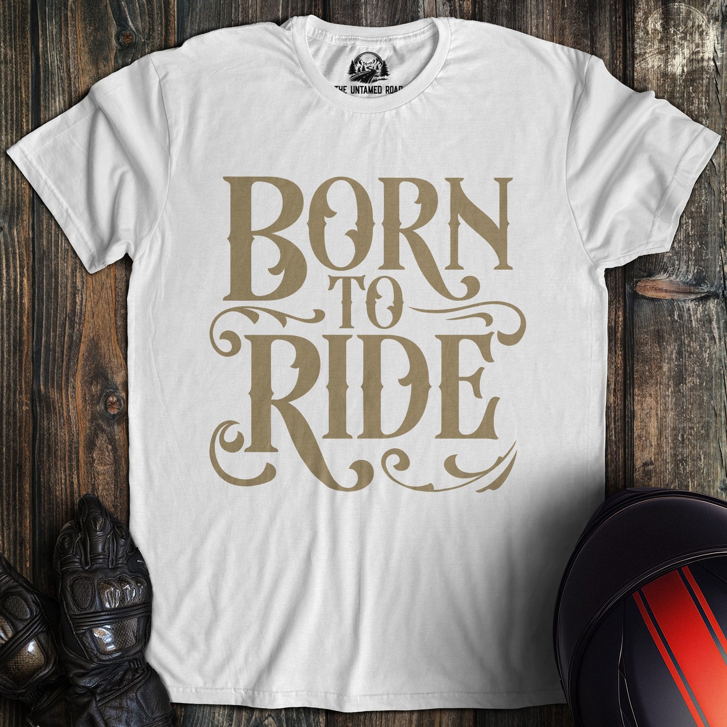 A white colored t-shirt with the words "born to ride gothic" printed on the front.