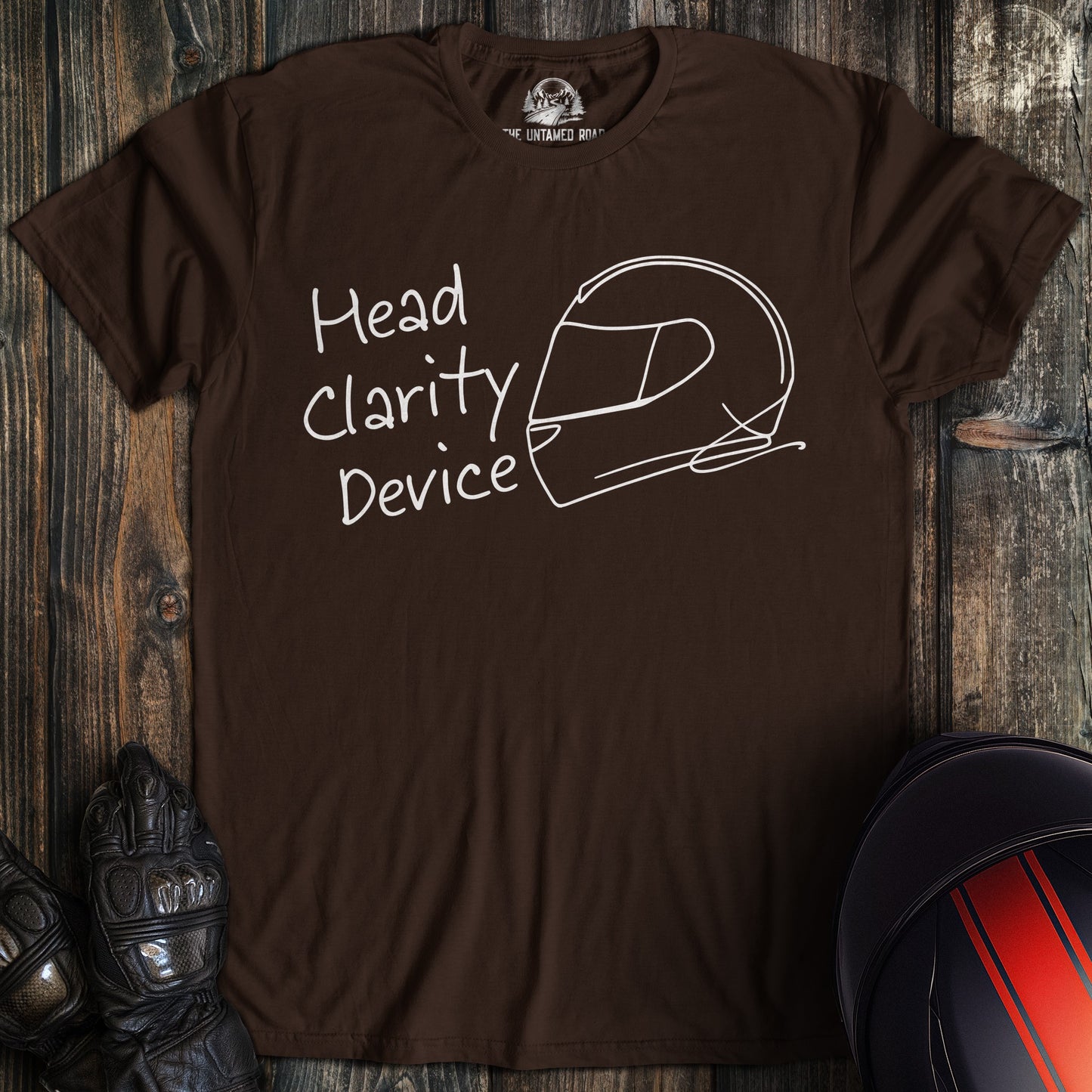 A dark brown t-shirt featuring a white line drawing of a motorcycle helmet and the text Head Clarity Device.