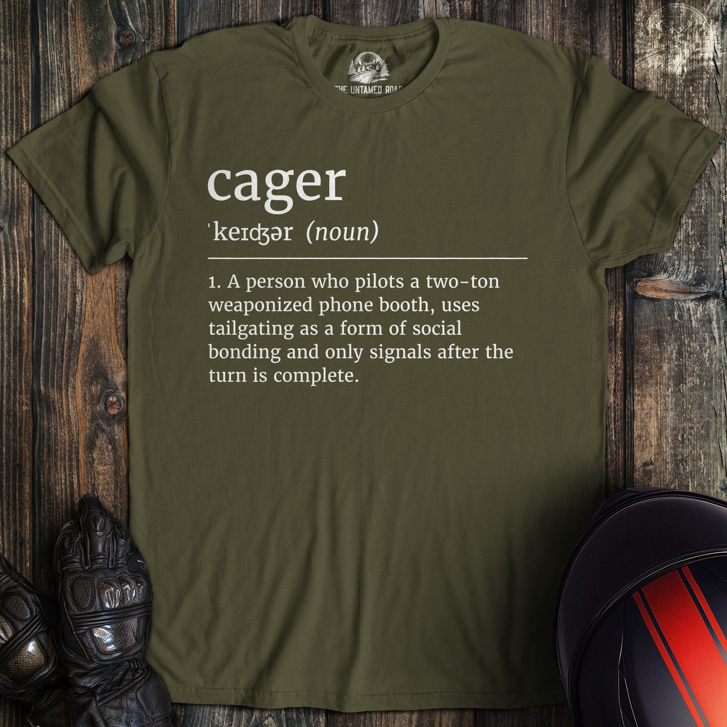 A military green colored t-shirt with the words "cager definition" printed on the front.