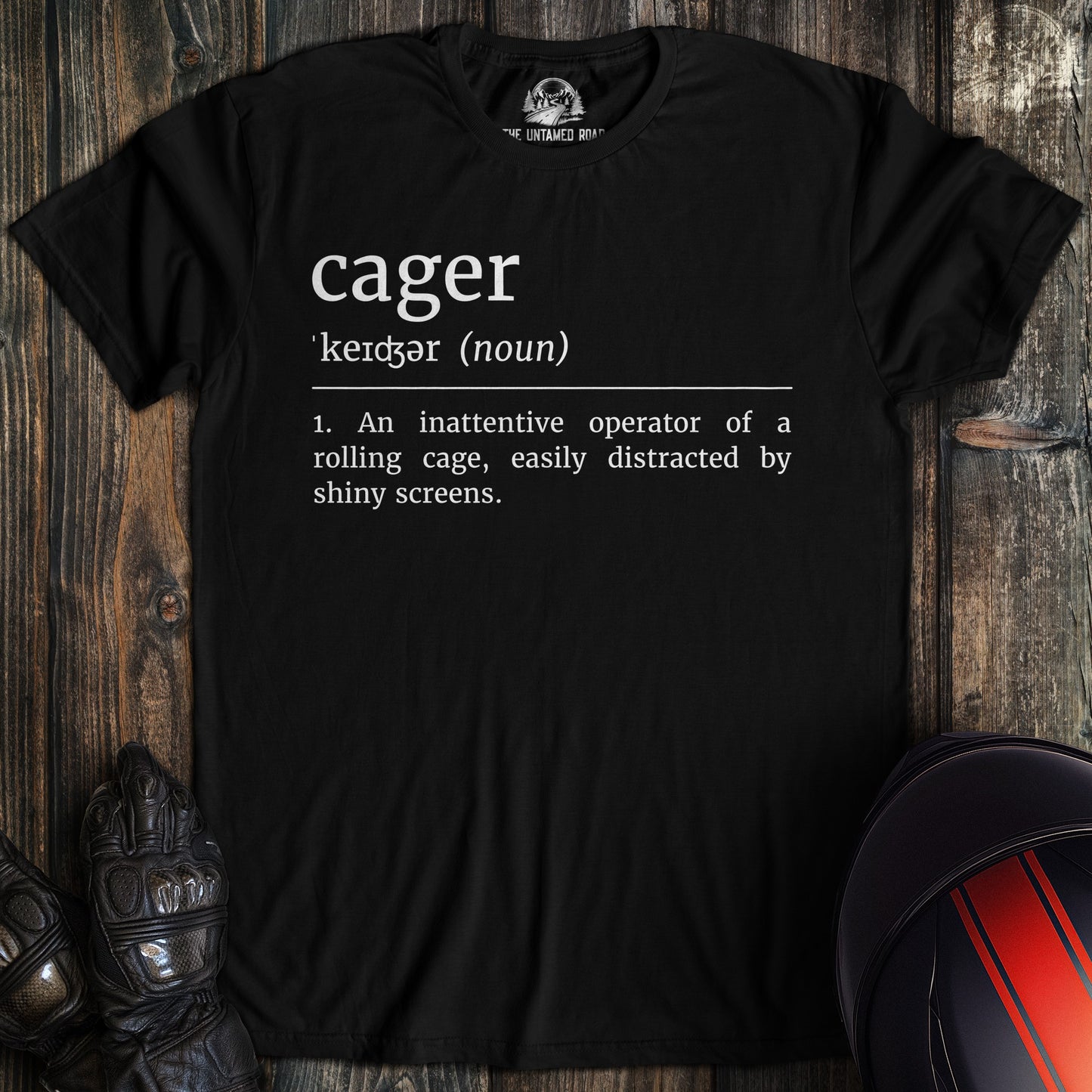A black colored t-shirt with the words "cager definition 2" printed on the front.