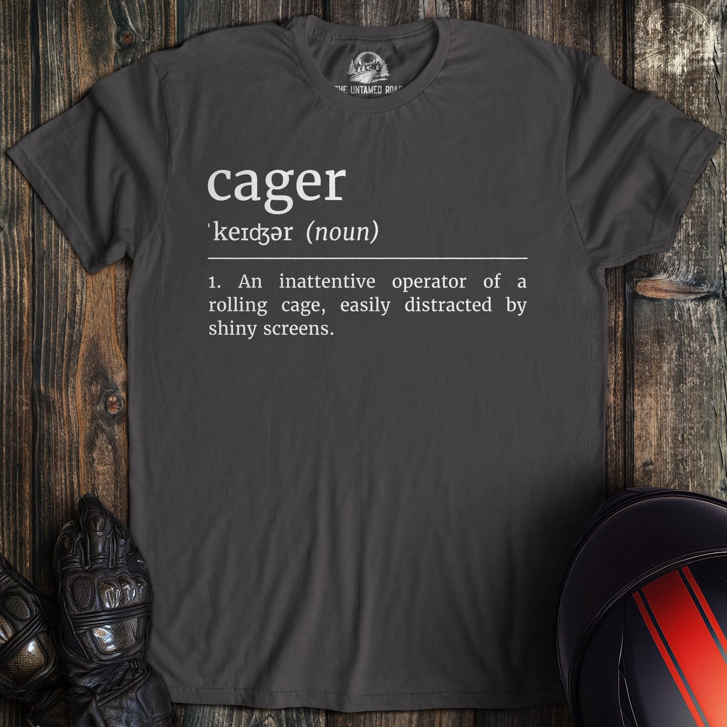 A charcoal colored t-shirt with the words "cager definition 2" printed on the front.