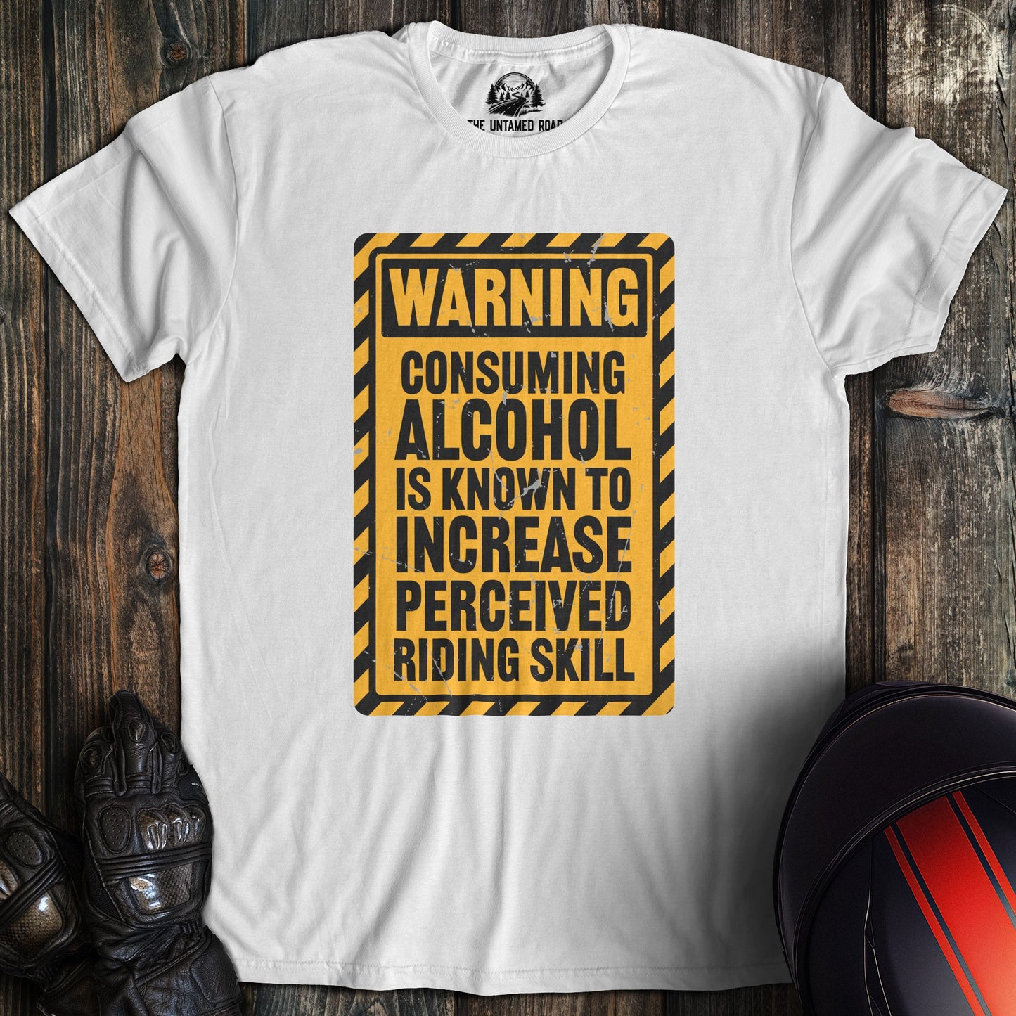 A white colored t-shirt with the words "alcohol riding skill" printed on the front.