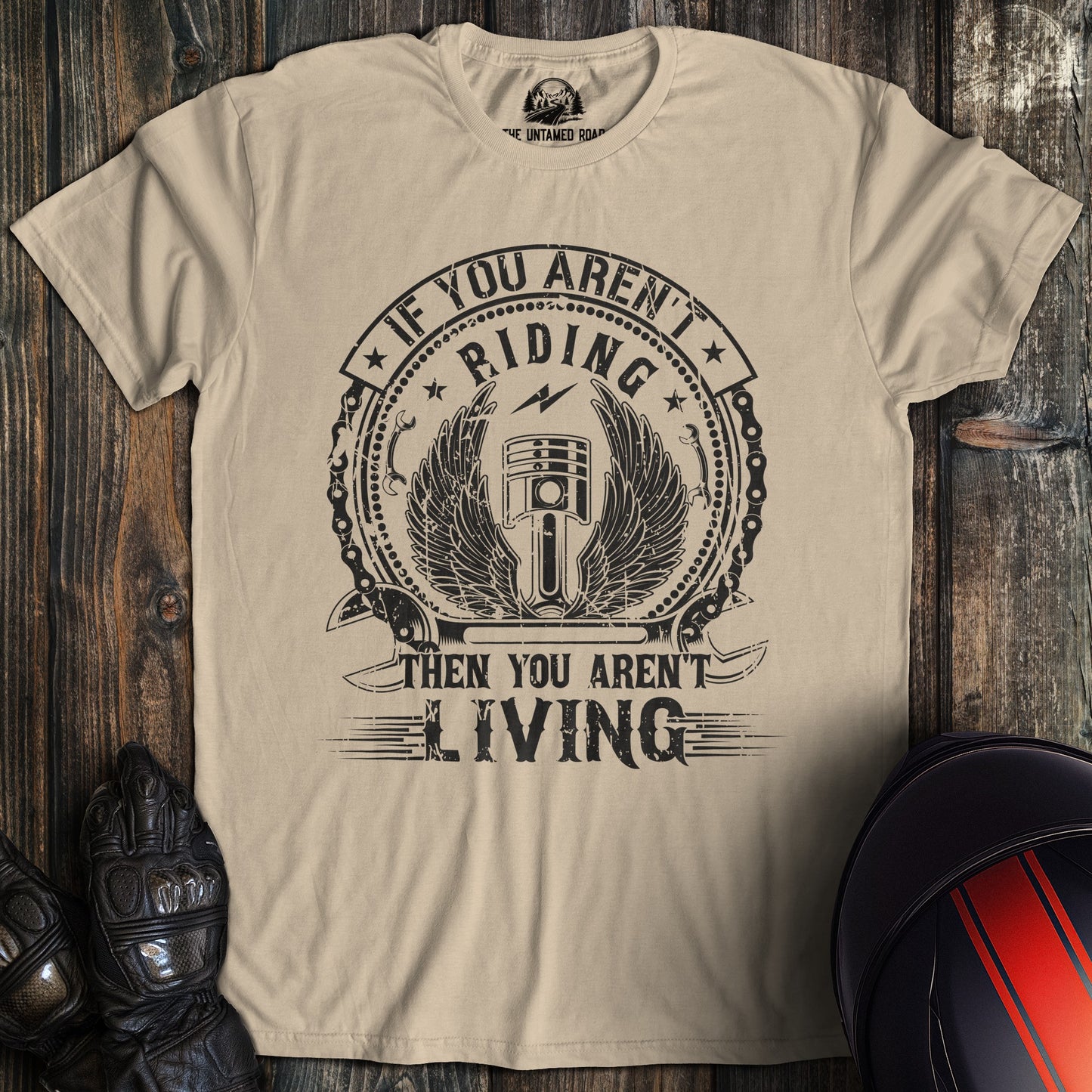 A sand colored t-shirt with the words "arent living" printed on the front.
