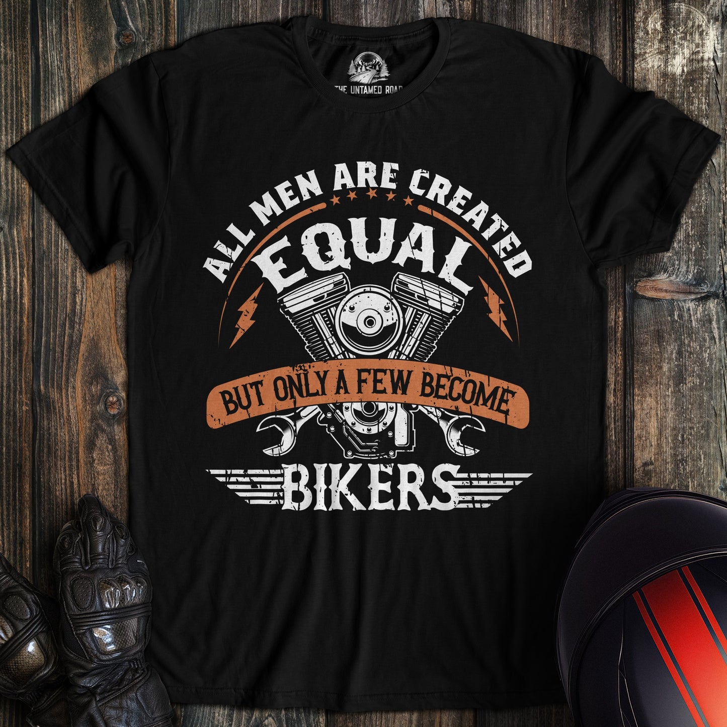 A black colored t-shirt with the words "men created equal" printed on the front.