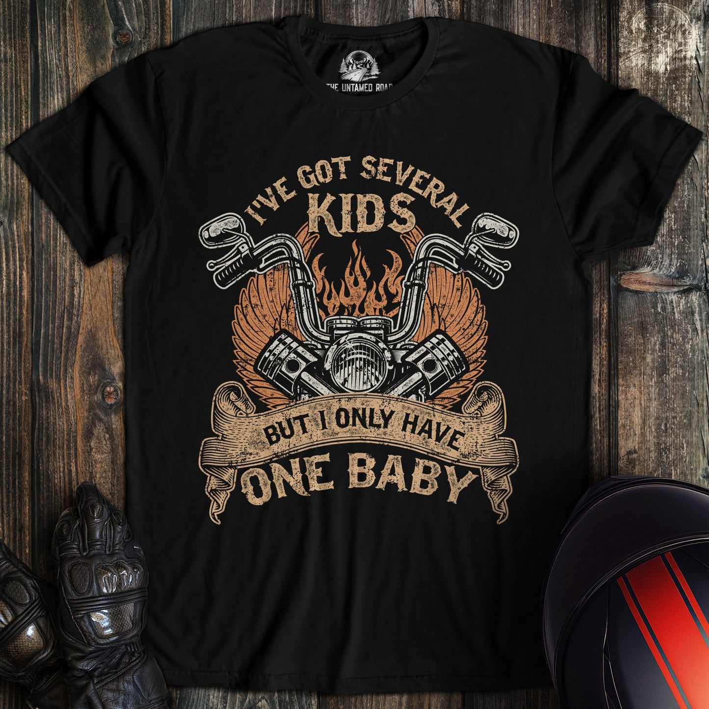 A black colored t-shirt with the words "one baby" printed on the front.