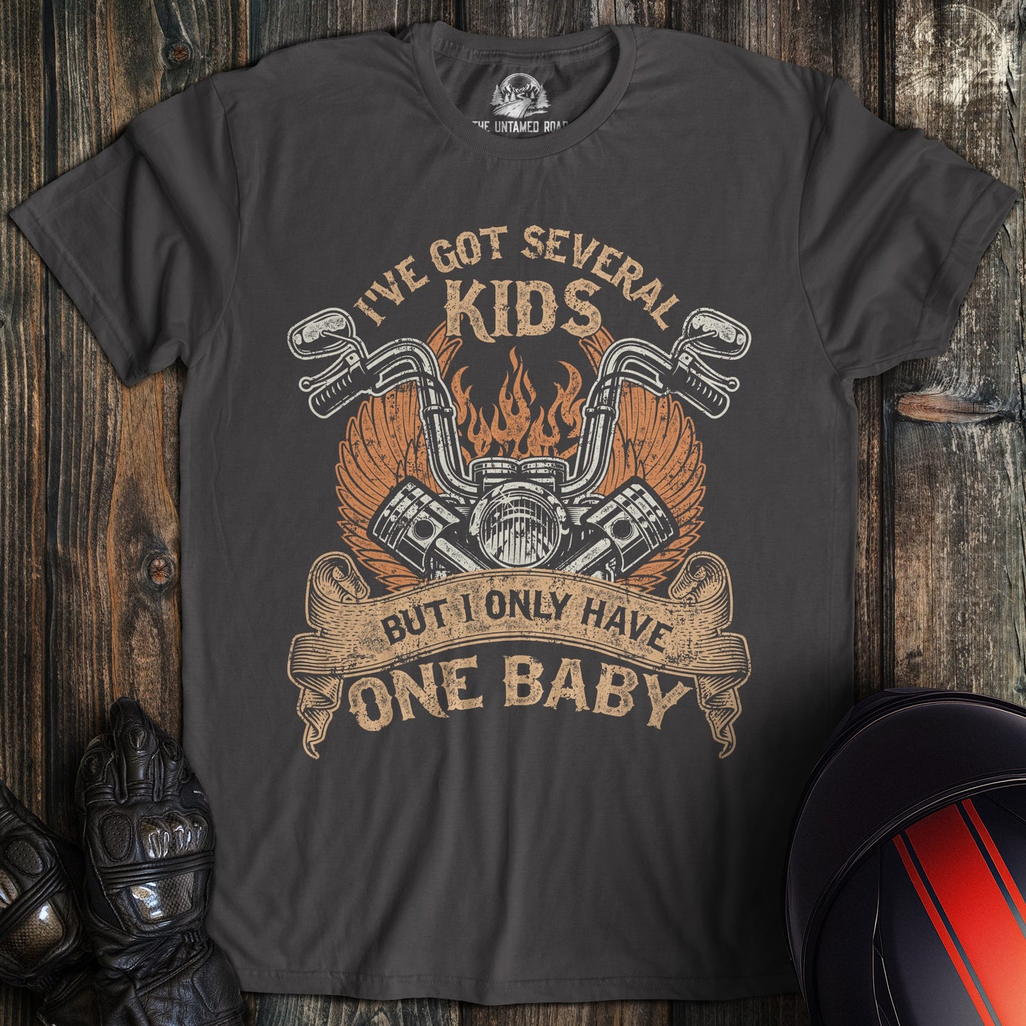 A charcoal colored t-shirt with the words "one baby" printed on the front.