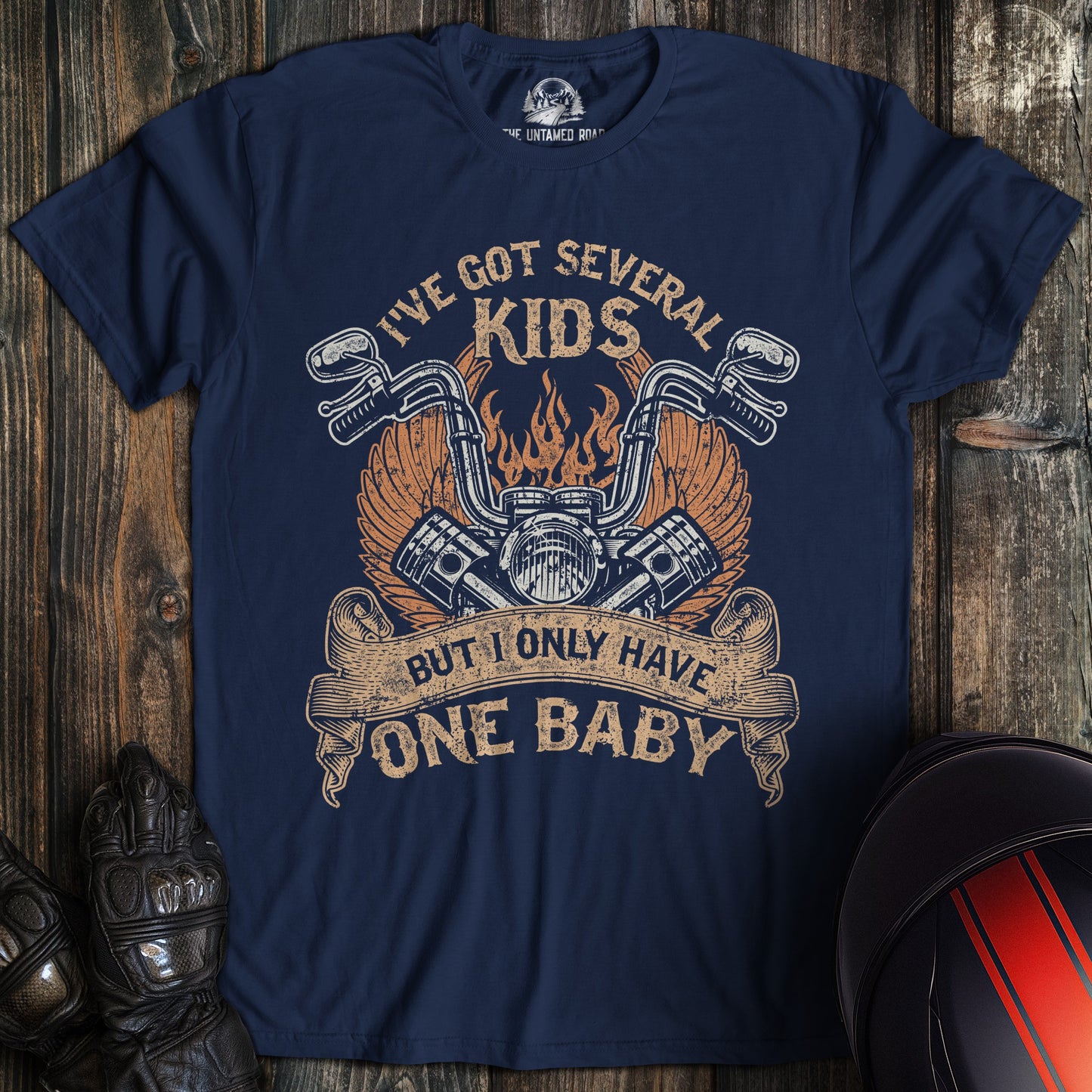 A navy colored t-shirt with the words "one baby" printed on the front.