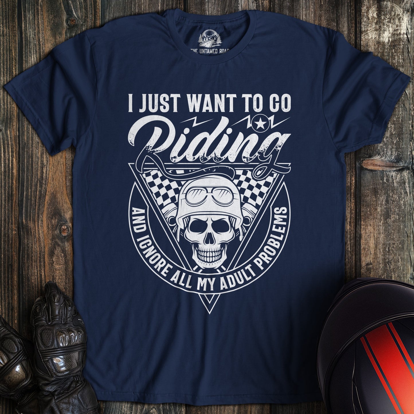 A navy colored t-shirt with the words "ignore adult problems" printed on the front.