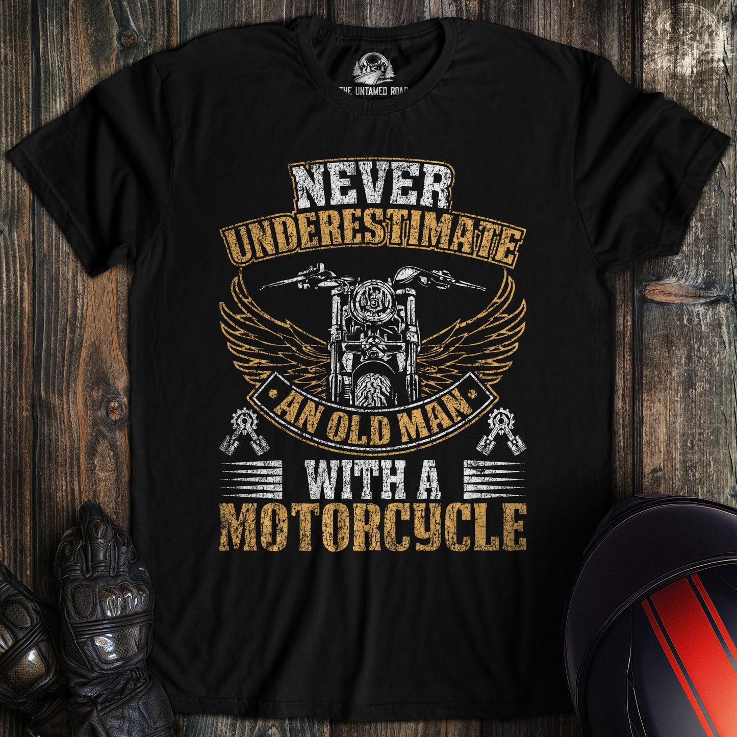 A black colored t-shirt with the words "old man motorcycle distressed" printed on the front.