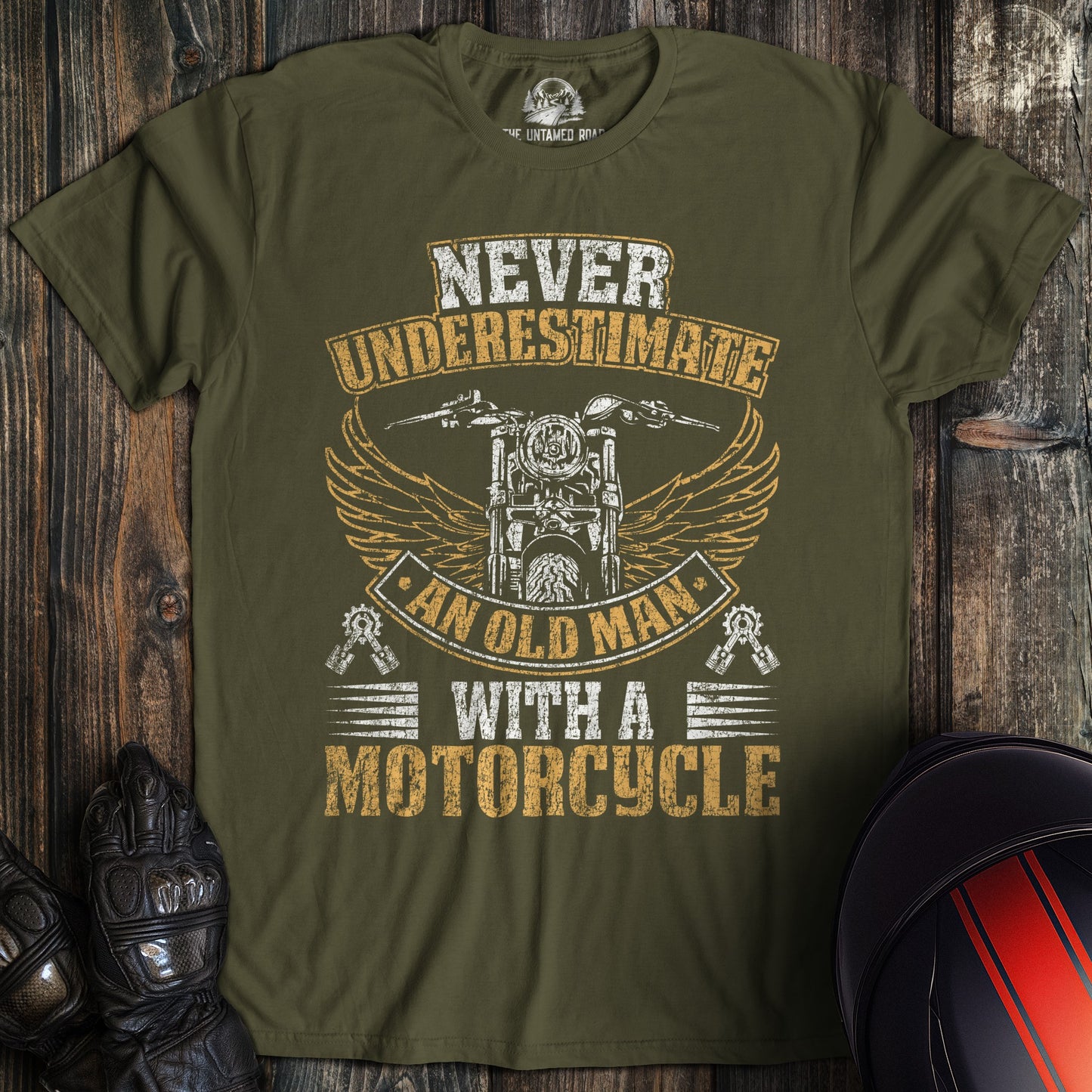 A military green colored t-shirt with the words "old man motorcycle distressed" printed on the front.