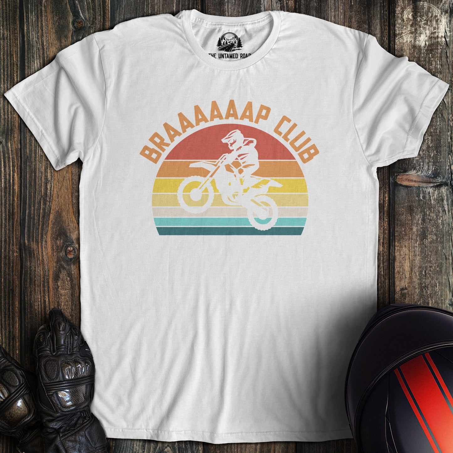 A white colored t-shirt with the words "braap club" printed on the front.